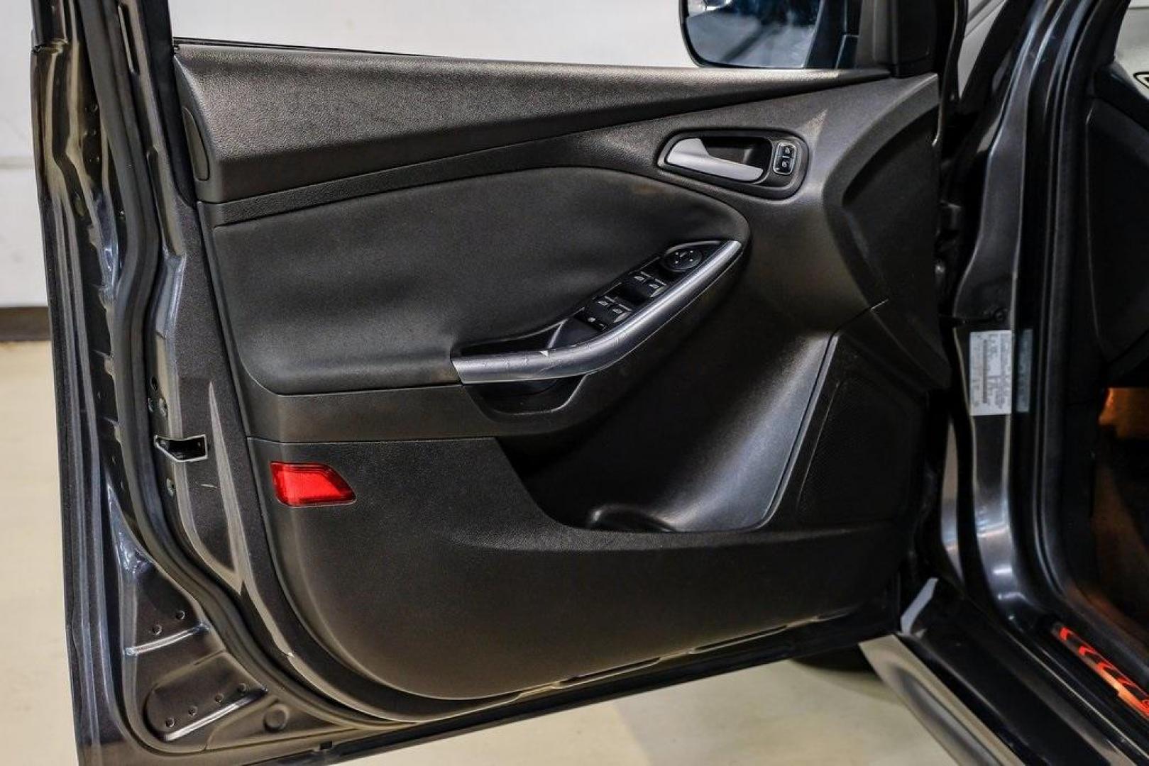 2015 Magnetic /Black Ford Focus ST (1FADP3L93FL) with an EcoBoost 2.0L I4 GTDi DOHC Turbocharged VCT engine, Manual transmission, located at 15300 Midway Rd., Addison, TX, 75001, (972) 702-0011, 32.958321, -96.838074 - 2015 Ford Focus ST<br><br>Now Available at Midway Auto Group, Addison, Texas<br><br>Sporty, aggressive, and built for enthusiasts the 2015 Ford Focus ST delivers turbocharged performance, sharp handling, and a driver-focused interior that sets it apart from traditional compact cars. With its signatu - Photo#46