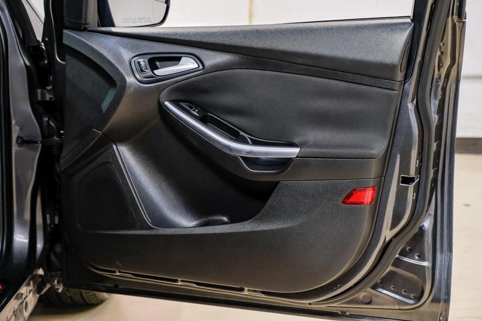 2015 Magnetic /Black Ford Focus ST (1FADP3L93FL) with an EcoBoost 2.0L I4 GTDi DOHC Turbocharged VCT engine, Manual transmission, located at 15300 Midway Rd., Addison, TX, 75001, (972) 702-0011, 32.958321, -96.838074 - 2015 Ford Focus ST<br><br>Now Available at Midway Auto Group, Addison, Texas<br><br>Sporty, aggressive, and built for enthusiasts the 2015 Ford Focus ST delivers turbocharged performance, sharp handling, and a driver-focused interior that sets it apart from traditional compact cars. With its signatu - Photo#48