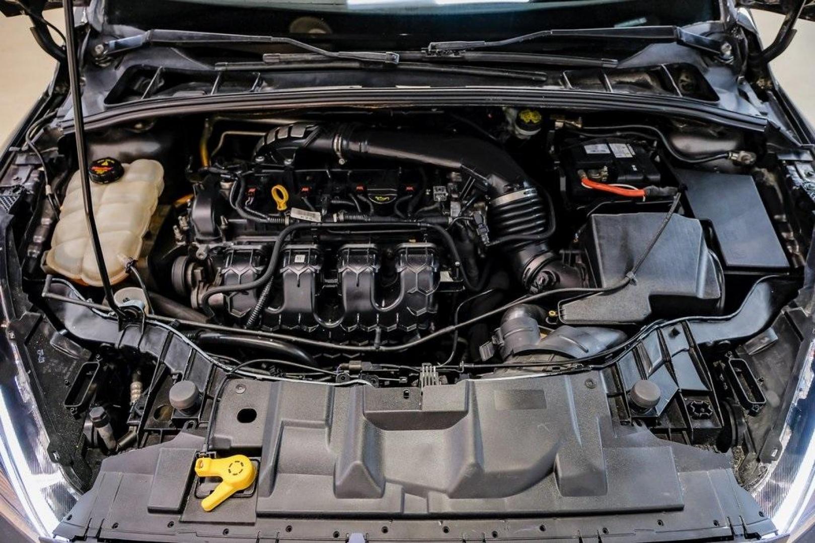 2015 Magnetic /Black Ford Focus ST (1FADP3L93FL) with an EcoBoost 2.0L I4 GTDi DOHC Turbocharged VCT engine, Manual transmission, located at 15300 Midway Rd., Addison, TX, 75001, (972) 702-0011, 32.958321, -96.838074 - 2015 Ford Focus ST<br><br>Now Available at Midway Auto Group, Addison, Texas<br><br>Sporty, aggressive, and built for enthusiasts the 2015 Ford Focus ST delivers turbocharged performance, sharp handling, and a driver-focused interior that sets it apart from traditional compact cars. With its signatu - Photo#54