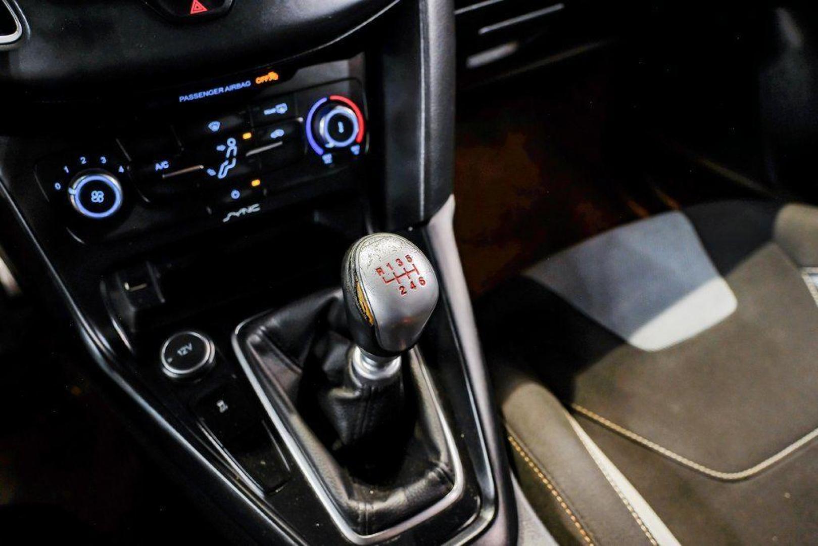 2015 Magnetic /Black Ford Focus ST (1FADP3L93FL) with an EcoBoost 2.0L I4 GTDi DOHC Turbocharged VCT engine, Manual transmission, located at 15300 Midway Rd., Addison, TX, 75001, (972) 702-0011, 32.958321, -96.838074 - 2015 Ford Focus ST<br><br>Now Available at Midway Auto Group, Addison, Texas<br><br>Sporty, aggressive, and built for enthusiasts the 2015 Ford Focus ST delivers turbocharged performance, sharp handling, and a driver-focused interior that sets it apart from traditional compact cars. With its signatu - Photo#28