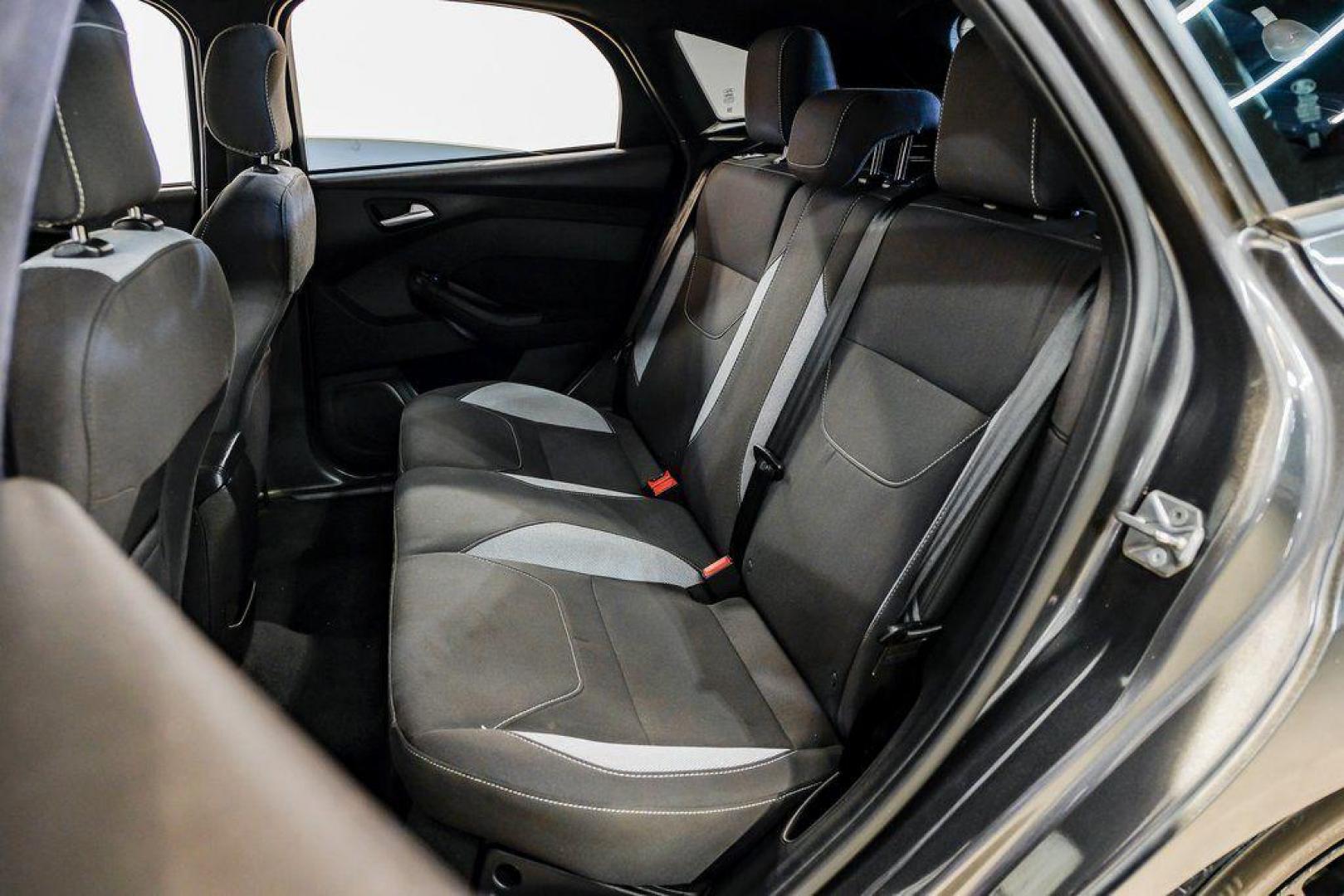 2015 Magnetic /Black Ford Focus ST (1FADP3L93FL) with an EcoBoost 2.0L I4 GTDi DOHC Turbocharged VCT engine, Manual transmission, located at 15300 Midway Rd., Addison, TX, 75001, (972) 702-0011, 32.958321, -96.838074 - 2015 Ford Focus ST<br><br>Now Available at Midway Auto Group, Addison, Texas<br><br>Sporty, aggressive, and built for enthusiasts the 2015 Ford Focus ST delivers turbocharged performance, sharp handling, and a driver-focused interior that sets it apart from traditional compact cars. With its signatu - Photo#43