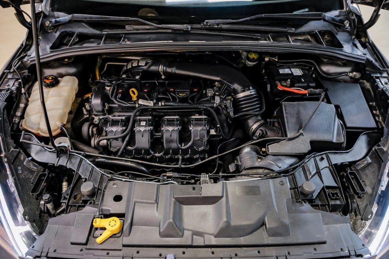 2015 Magnetic /Black Ford Focus ST (1FADP3L93FL) with an EcoBoost 2.0L I4 GTDi DOHC Turbocharged VCT engine, Manual transmission, located at 15300 Midway Rd., Addison, TX, 75001, (972) 702-0011, 32.958321, -96.838074 - 2015 Ford Focus ST<br><br>Now Available at Midway Auto Group, Addison, Texas<br><br>Sporty, aggressive, and built for enthusiasts the 2015 Ford Focus ST delivers turbocharged performance, sharp handling, and a driver-focused interior that sets it apart from traditional compact cars. With its signatu - Photo#54