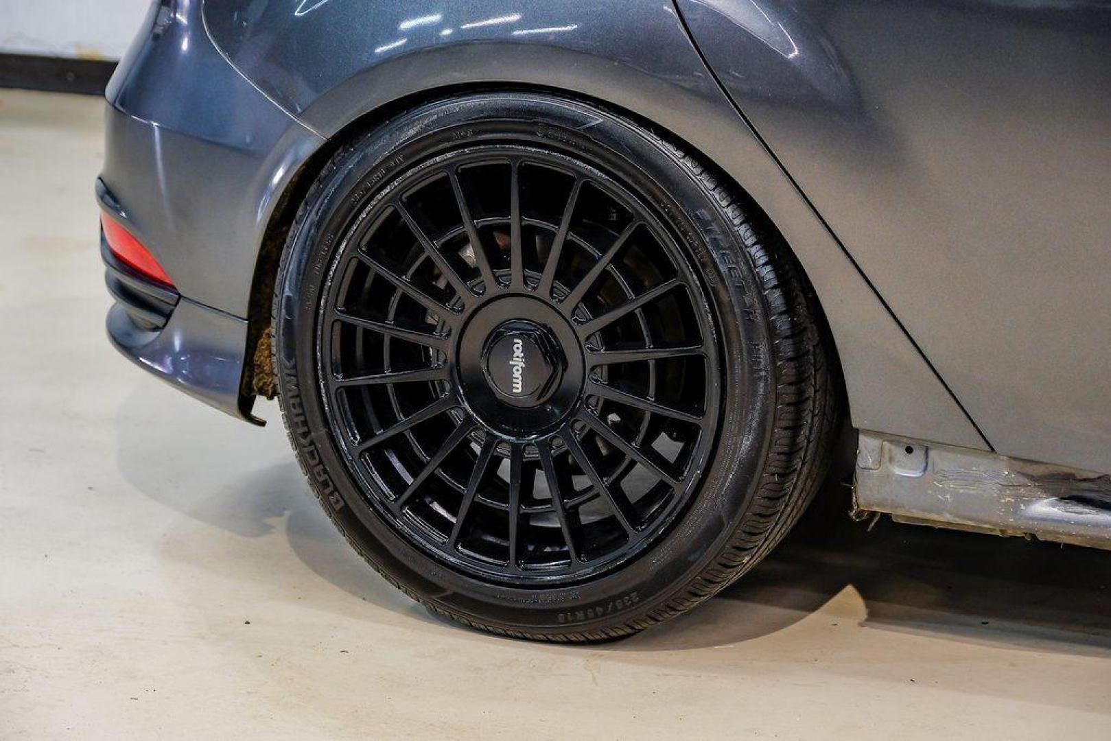 2015 Magnetic /Black Ford Focus ST (1FADP3L93FL) with an EcoBoost 2.0L I4 GTDi DOHC Turbocharged VCT engine, Manual transmission, located at 15300 Midway Rd., Addison, TX, 75001, (972) 702-0011, 32.958321, -96.838074 - 2015 Ford Focus ST<br><br>Now Available at Midway Auto Group, Addison, Texas<br><br>Sporty, aggressive, and built for enthusiasts the 2015 Ford Focus ST delivers turbocharged performance, sharp handling, and a driver-focused interior that sets it apart from traditional compact cars. With its signatu - Photo#58