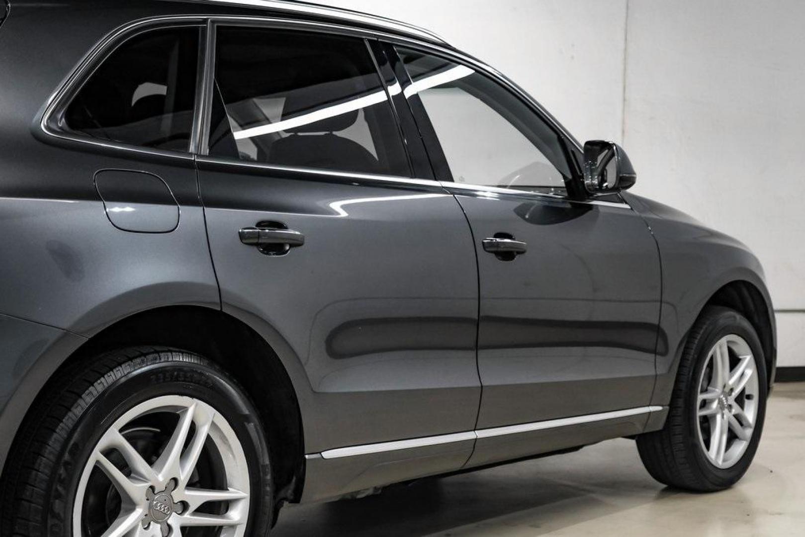 2017 Daytona Gray Pearl /Black Audi Q5 2.0T Premium Plus (WA1L2AFP8HA) with an 2.0L 4-Cylinder TFSI engine, Automatic transmission, located at 15300 Midway Rd., Addison, TX, 75001, (972) 702-0011, 32.958321, -96.838074 - 2018 Audi Q7 2.0T Premium Plus Quattro<br><br>Now Available at Midway Auto Group, Addison, Texas<br><br>Sophisticated, powerful, and exceptionally refined the 2018 Audi Q7 Premium Plus Quattro delivers true luxury SUV performance with three-row versatility and advanced German engineering. With a pre - Photo#13