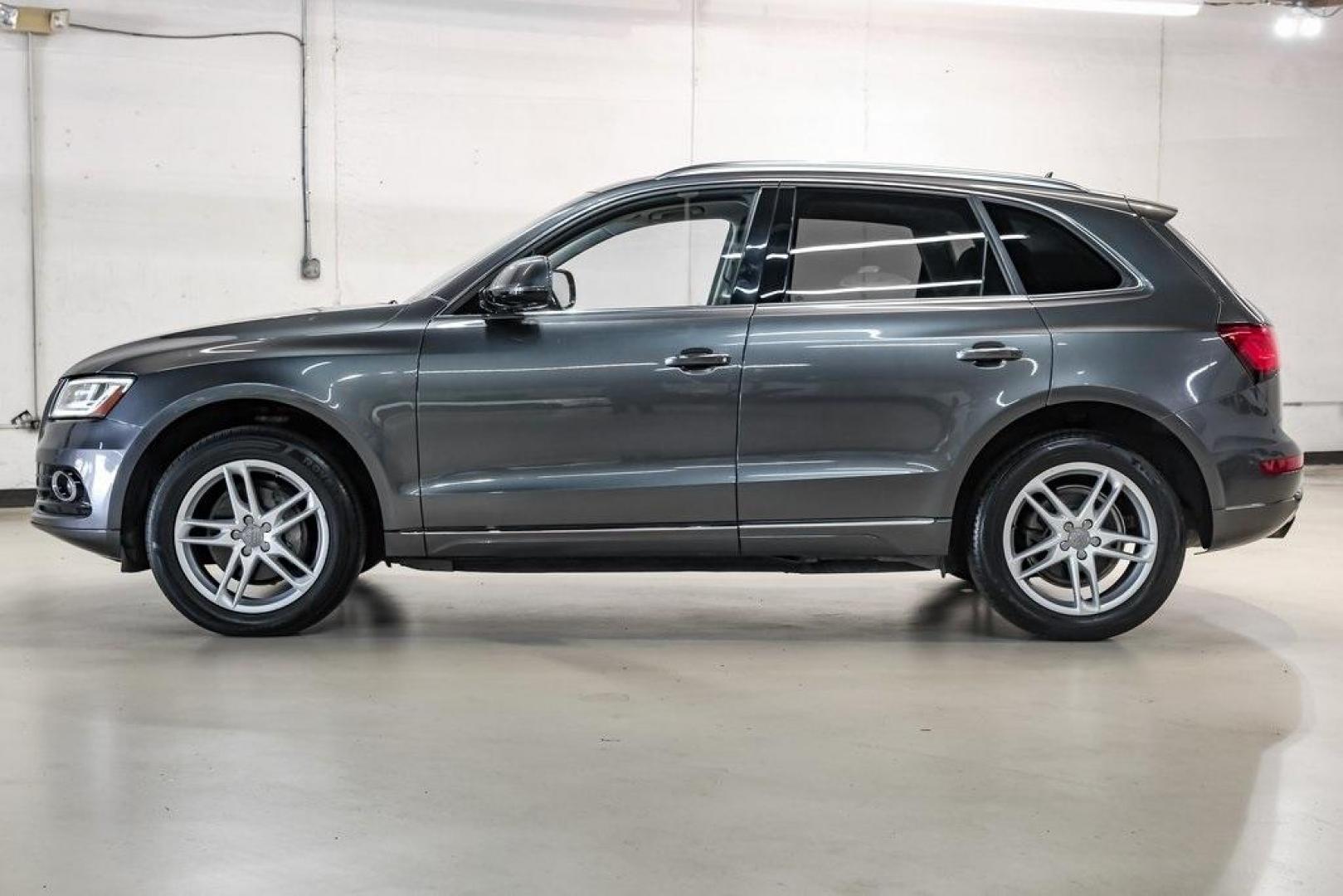 2017 Daytona Gray Pearl /Black Audi Q5 2.0T Premium Plus (WA1L2AFP8HA) with an 2.0L 4-Cylinder TFSI engine, Automatic transmission, located at 15300 Midway Rd., Addison, TX, 75001, (972) 702-0011, 32.958321, -96.838074 - 2018 Audi Q7 2.0T Premium Plus Quattro<br><br>Now Available at Midway Auto Group, Addison, Texas<br><br>Sophisticated, powerful, and exceptionally refined the 2018 Audi Q7 Premium Plus Quattro delivers true luxury SUV performance with three-row versatility and advanced German engineering. With a pre - Photo#18