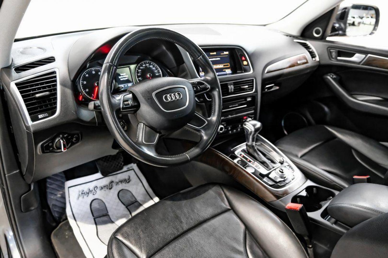 2017 Daytona Gray Pearl /Black Audi Q5 2.0T Premium Plus (WA1L2AFP8HA) with an 2.0L 4-Cylinder TFSI engine, Automatic transmission, located at 15300 Midway Rd., Addison, TX, 75001, (972) 702-0011, 32.958321, -96.838074 - 2018 Audi Q7 2.0T Premium Plus Quattro<br><br>Now Available at Midway Auto Group, Addison, Texas<br><br>Sophisticated, powerful, and exceptionally refined the 2018 Audi Q7 Premium Plus Quattro delivers true luxury SUV performance with three-row versatility and advanced German engineering. With a pre - Photo#2