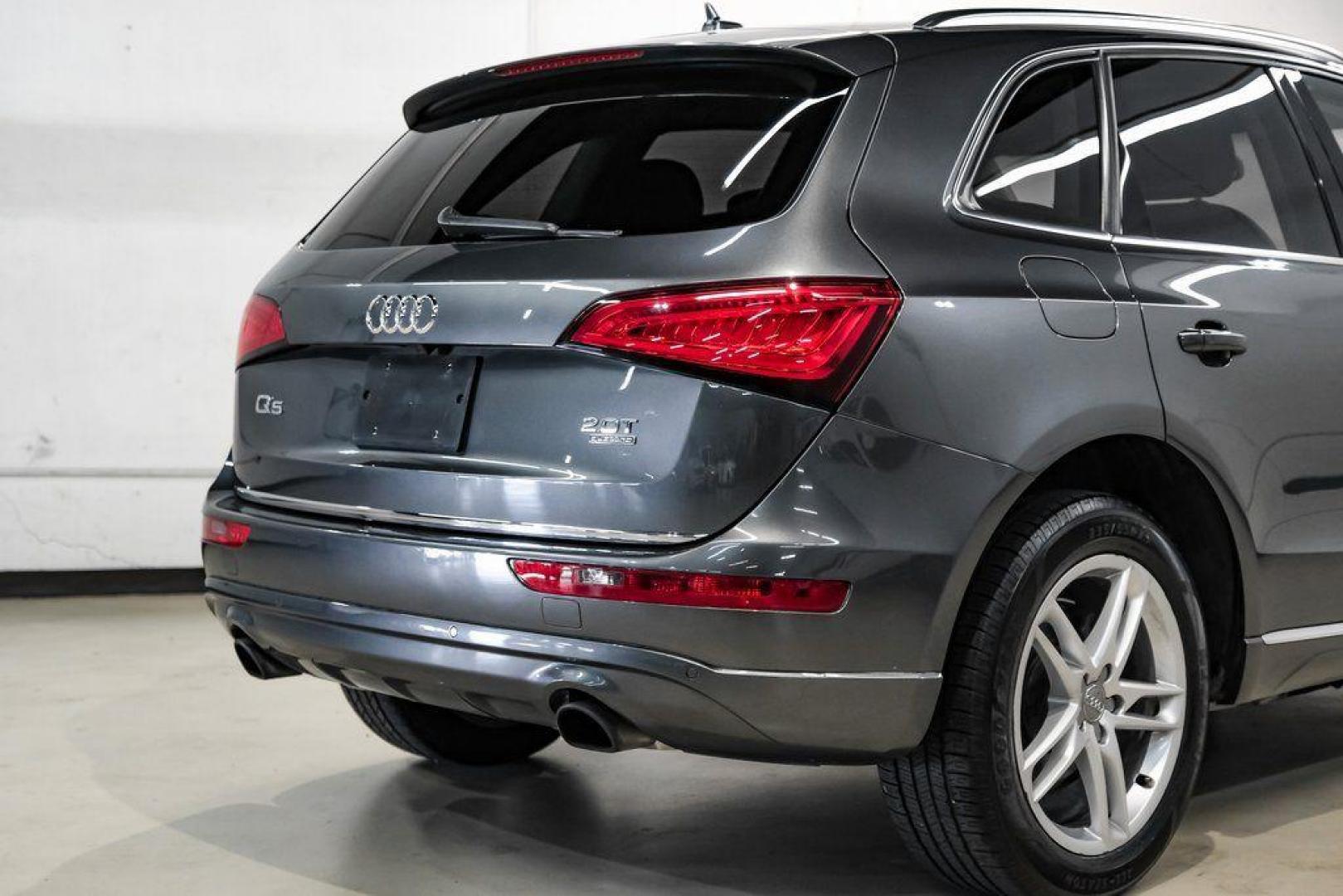 2017 Daytona Gray Pearl /Black Audi Q5 2.0T Premium Plus (WA1L2AFP8HA) with an 2.0L 4-Cylinder TFSI engine, Automatic transmission, located at 15300 Midway Rd., Addison, TX, 75001, (972) 702-0011, 32.958321, -96.838074 - 2018 Audi Q7 2.0T Premium Plus Quattro<br><br>Now Available at Midway Auto Group, Addison, Texas<br><br>Sophisticated, powerful, and exceptionally refined the 2018 Audi Q7 Premium Plus Quattro delivers true luxury SUV performance with three-row versatility and advanced German engineering. With a pre - Photo#12