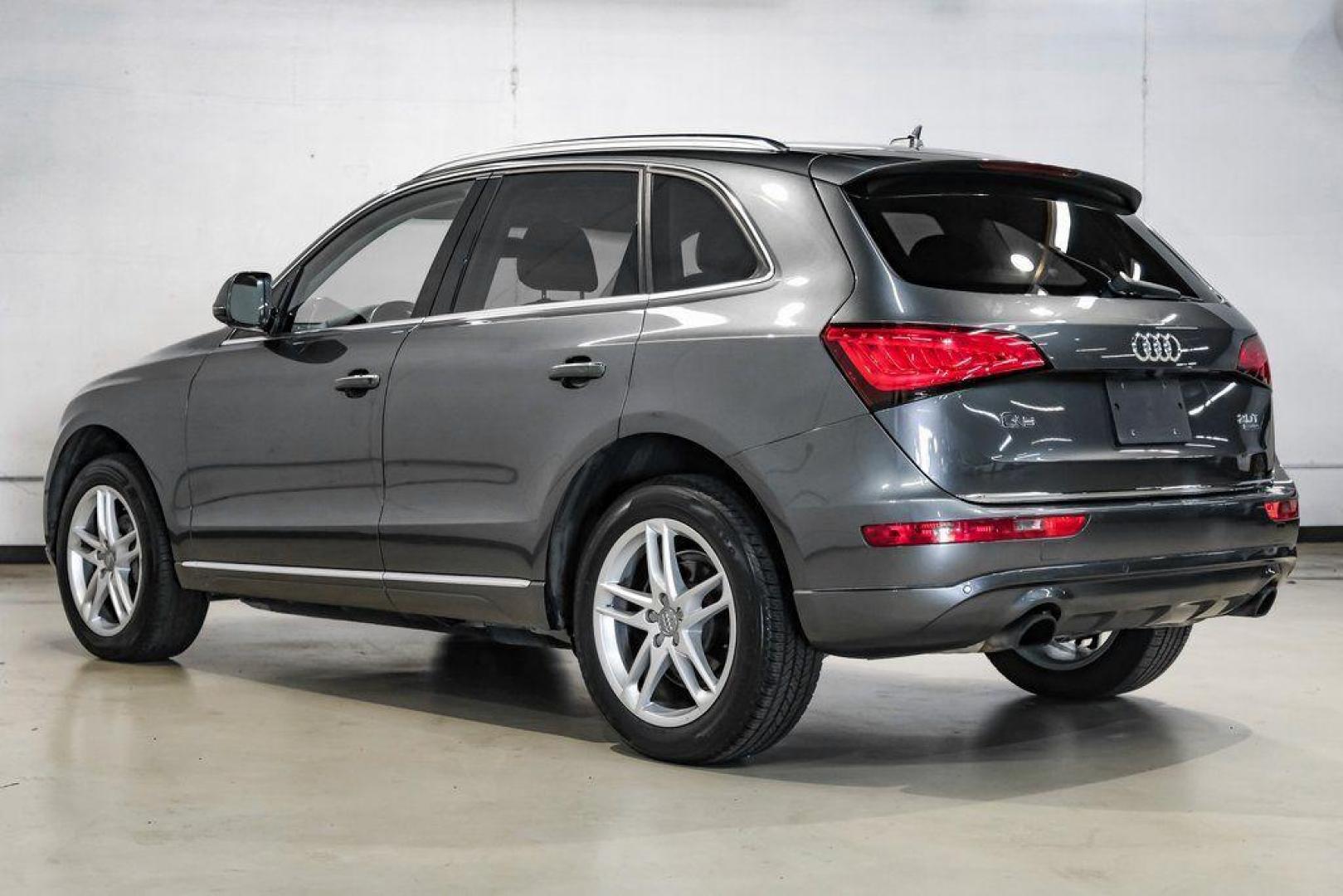 2017 Daytona Gray Pearl /Black Audi Q5 2.0T Premium Plus (WA1L2AFP8HA) with an 2.0L 4-Cylinder TFSI engine, Automatic transmission, located at 15300 Midway Rd., Addison, TX, 75001, (972) 702-0011, 32.958321, -96.838074 - 2018 Audi Q7 2.0T Premium Plus Quattro<br><br>Now Available at Midway Auto Group, Addison, Texas<br><br>Sophisticated, powerful, and exceptionally refined the 2018 Audi Q7 Premium Plus Quattro delivers true luxury SUV performance with three-row versatility and advanced German engineering. With a pre - Photo#15
