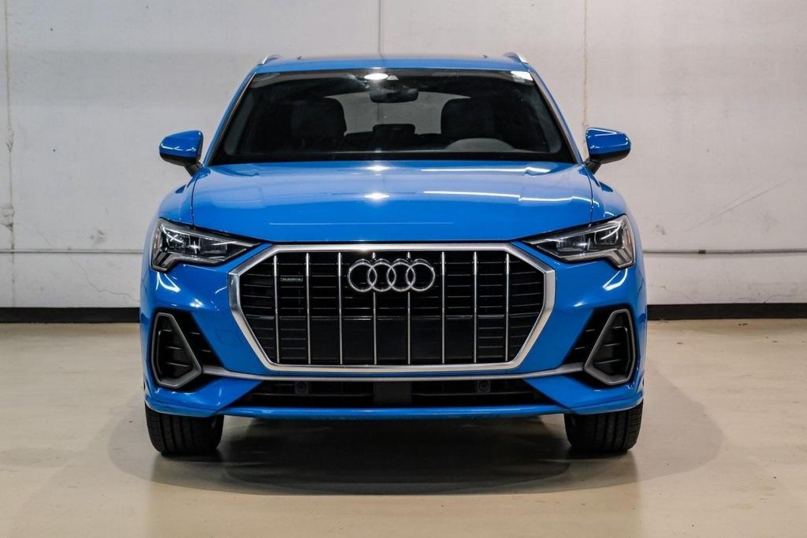2020 Blue /Rotor Gray W/Anthracite Audi Q3 Premium Plus S line (WA1EEDF37L1) with an 2.0L 4-Cylinder TFSI engine, Automatic transmission, located at 15300 Midway Rd., Addison, TX, 75001, (972) 702-0011, 32.958321, -96.838074 - 020 Audi Q3 S line Premium Plus Quattro<br><br>Now Available at Midway Auto Group, Addison, Texas<br><br>Stylish, compact, and packed with premium features the 2020 Audi Q3 S line Premium Plus Quattro delivers upscale comfort and confident performance in a versatile small SUV. With its S line exteri - Photo#5