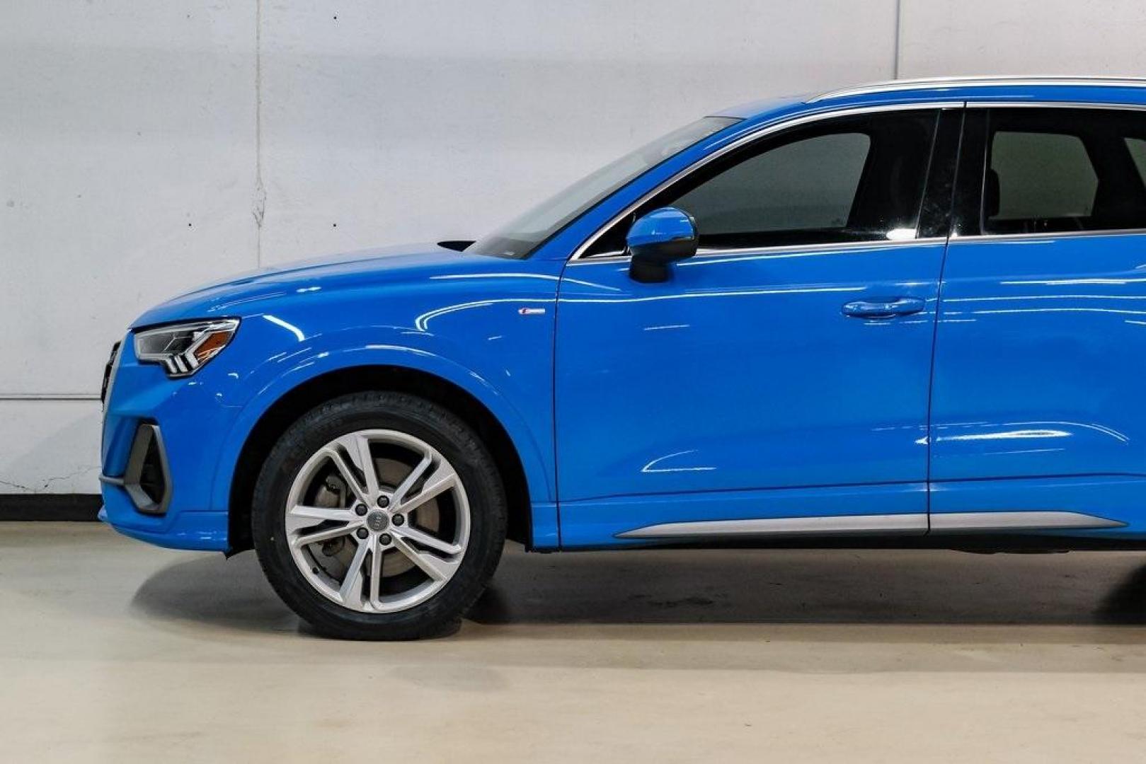 2020 Blue /Rotor Gray W/Anthracite Audi Q3 Premium Plus S line (WA1EEDF37L1) with an 2.0L 4-Cylinder TFSI engine, Automatic transmission, located at 15300 Midway Rd., Addison, TX, 75001, (972) 702-0011, 32.958321, -96.838074 - 020 Audi Q3 S line Premium Plus Quattro<br><br>Now Available at Midway Auto Group, Addison, Texas<br><br>Stylish, compact, and packed with premium features the 2020 Audi Q3 S line Premium Plus Quattro delivers upscale comfort and confident performance in a versatile small SUV. With its S line exteri - Photo#12