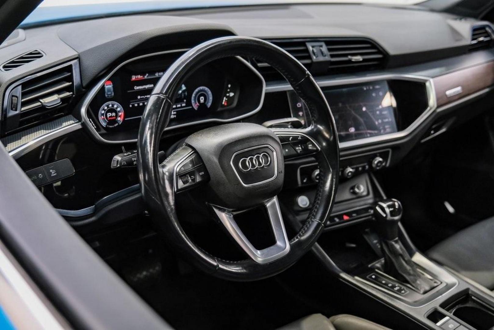 2020 Blue /Rotor Gray W/Anthracite Audi Q3 Premium Plus S line (WA1EEDF37L1) with an 2.0L 4-Cylinder TFSI engine, Automatic transmission, located at 15300 Midway Rd., Addison, TX, 75001, (972) 702-0011, 32.958321, -96.838074 - 020 Audi Q3 S line Premium Plus Quattro<br><br>Now Available at Midway Auto Group, Addison, Texas<br><br>Stylish, compact, and packed with premium features the 2020 Audi Q3 S line Premium Plus Quattro delivers upscale comfort and confident performance in a versatile small SUV. With its S line exteri - Photo#17