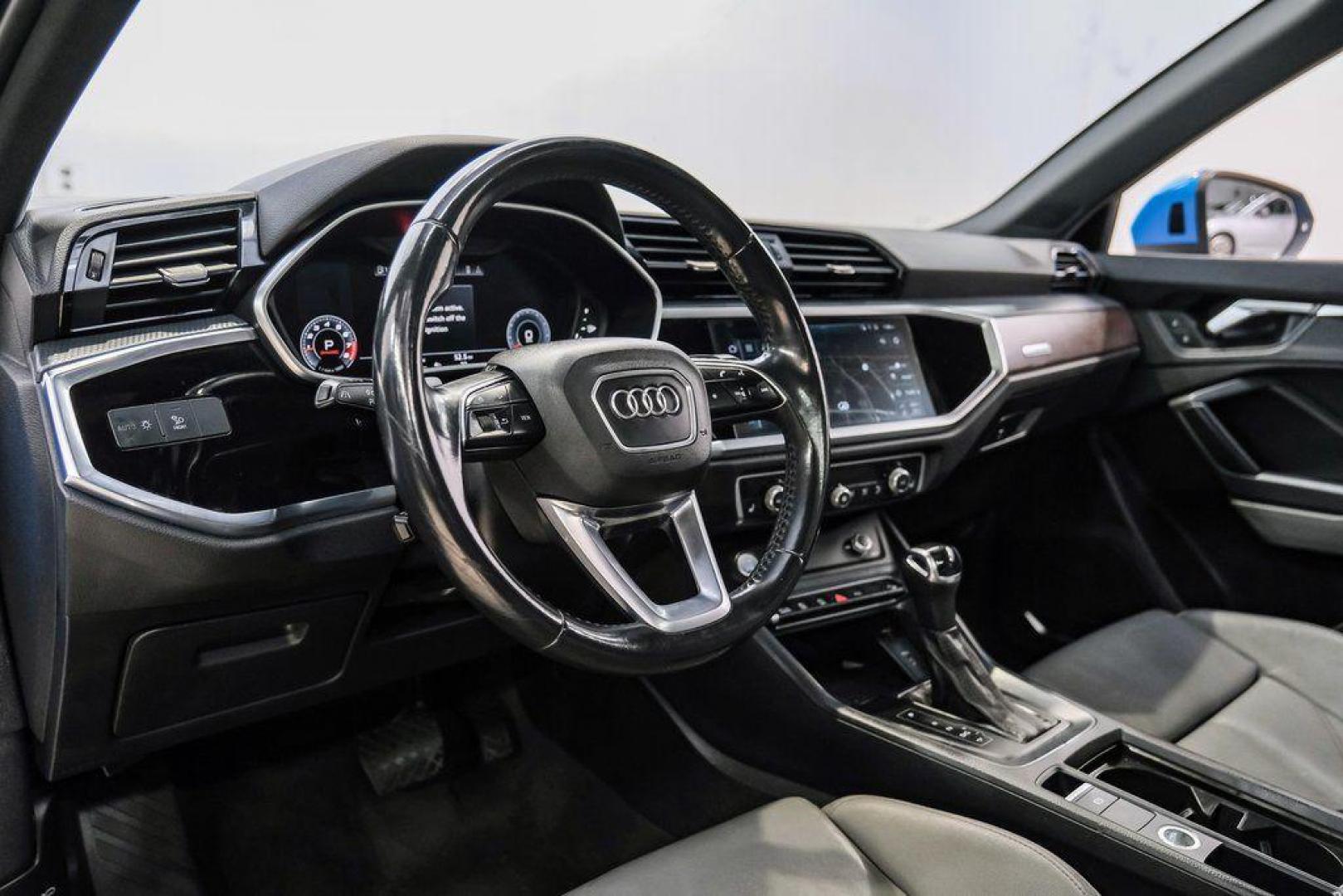 2020 Blue /Rotor Gray W/Anthracite Audi Q3 Premium Plus S line (WA1EEDF37L1) with an 2.0L 4-Cylinder TFSI engine, Automatic transmission, located at 15300 Midway Rd., Addison, TX, 75001, (972) 702-0011, 32.958321, -96.838074 - 020 Audi Q3 S line Premium Plus Quattro<br><br>Now Available at Midway Auto Group, Addison, Texas<br><br>Stylish, compact, and packed with premium features the 2020 Audi Q3 S line Premium Plus Quattro delivers upscale comfort and confident performance in a versatile small SUV. With its S line exteri - Photo#2