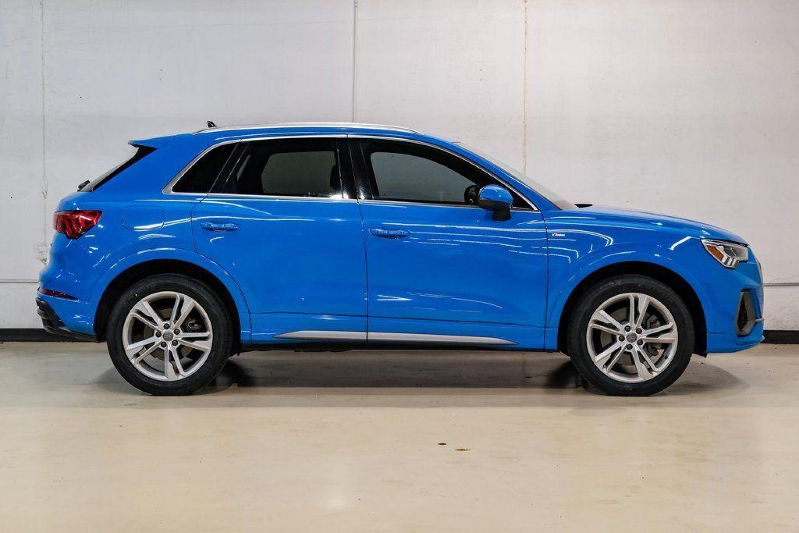 2020 Blue /Rotor Gray W/Anthracite Audi Q3 Premium Plus S line (WA1EEDF37L1) with an 2.0L 4-Cylinder TFSI engine, Automatic transmission, located at 15300 Midway Rd., Addison, TX, 75001, (972) 702-0011, 32.958321, -96.838074 - 020 Audi Q3 S line Premium Plus Quattro<br><br>Now Available at Midway Auto Group, Addison, Texas<br><br>Stylish, compact, and packed with premium features the 2020 Audi Q3 S line Premium Plus Quattro delivers upscale comfort and confident performance in a versatile small SUV. With its S line exteri - Photo#7