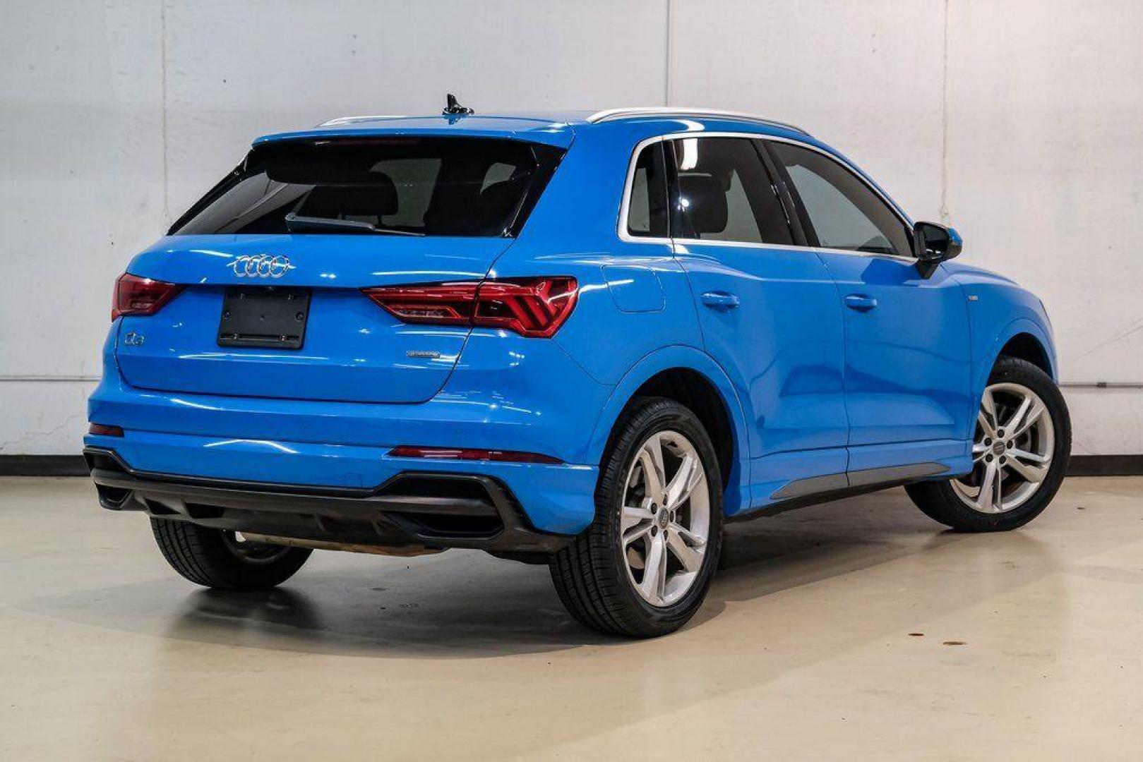 2020 Blue /Rotor Gray W/Anthracite Audi Q3 Premium Plus S line (WA1EEDF37L1) with an 2.0L 4-Cylinder TFSI engine, Automatic transmission, located at 15300 Midway Rd., Addison, TX, 75001, (972) 702-0011, 32.958321, -96.838074 - 020 Audi Q3 S line Premium Plus Quattro<br><br>Now Available at Midway Auto Group, Addison, Texas<br><br>Stylish, compact, and packed with premium features the 2020 Audi Q3 S line Premium Plus Quattro delivers upscale comfort and confident performance in a versatile small SUV. With its S line exteri - Photo#8