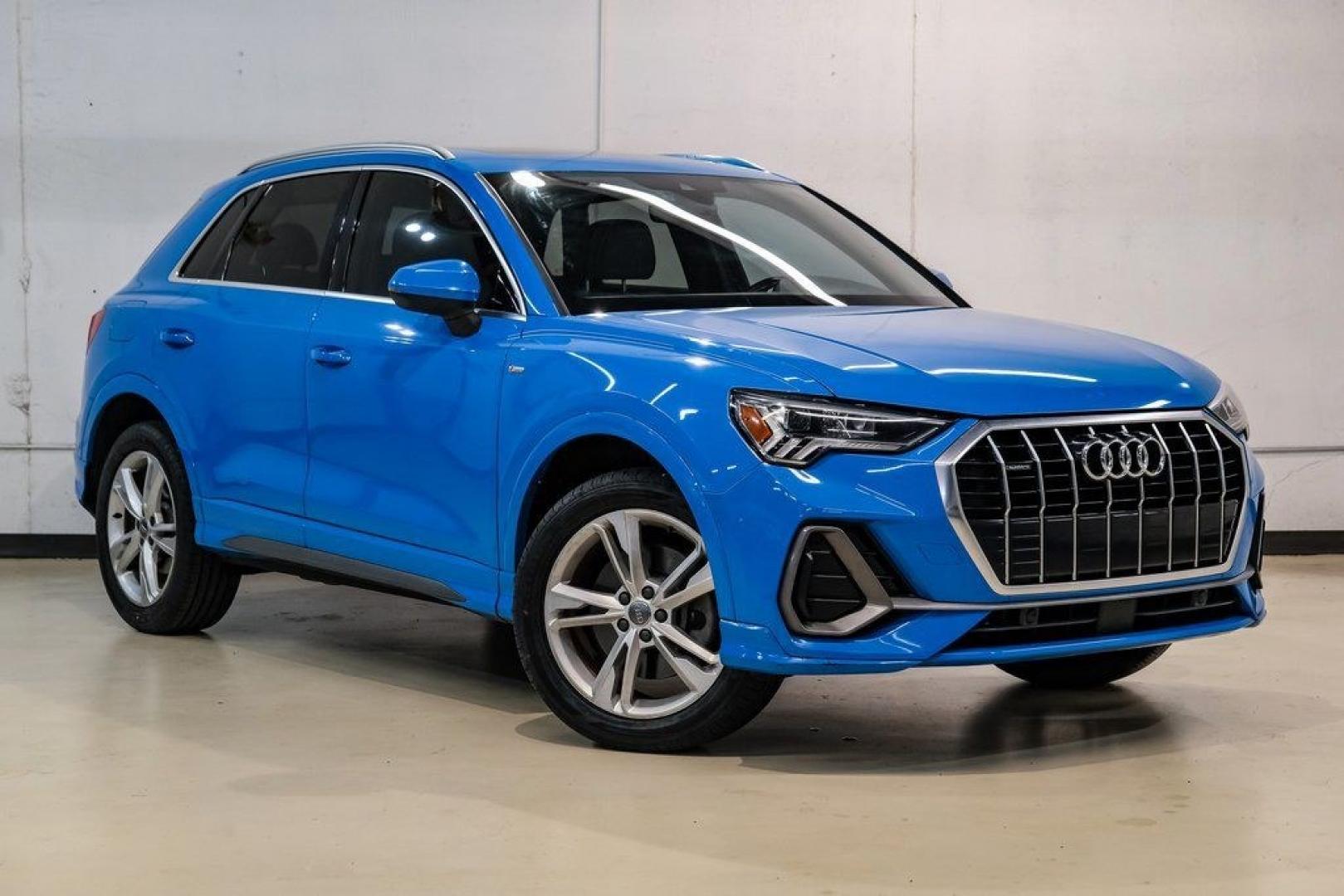 2020 Blue /Rotor Gray W/Anthracite Audi Q3 Premium Plus S line (WA1EEDF37L1) with an 2.0L 4-Cylinder TFSI engine, Automatic transmission, located at 15300 Midway Rd., Addison, TX, 75001, (972) 702-0011, 32.958321, -96.838074 - 020 Audi Q3 S line Premium Plus Quattro<br><br>Now Available at Midway Auto Group, Addison, Texas<br><br>Stylish, compact, and packed with premium features the 2020 Audi Q3 S line Premium Plus Quattro delivers upscale comfort and confident performance in a versatile small SUV. With its S line exteri- Photo#6