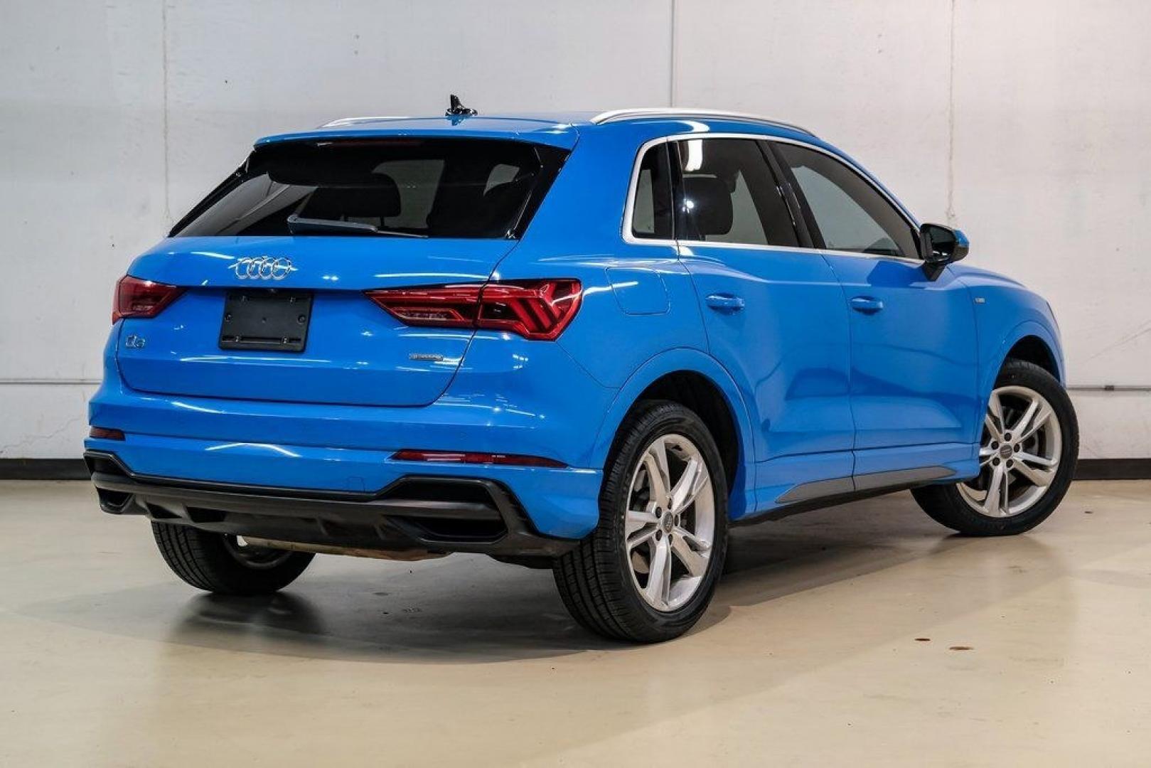 2020 Blue /Rotor Gray W/Anthracite Audi Q3 Premium Plus S line (WA1EEDF37L1) with an 2.0L 4-Cylinder TFSI engine, Automatic transmission, located at 15300 Midway Rd., Addison, TX, 75001, (972) 702-0011, 32.958321, -96.838074 - 020 Audi Q3 S line Premium Plus Quattro<br><br>Now Available at Midway Auto Group, Addison, Texas<br><br>Stylish, compact, and packed with premium features the 2020 Audi Q3 S line Premium Plus Quattro delivers upscale comfort and confident performance in a versatile small SUV. With its S line exteri- Photo#8