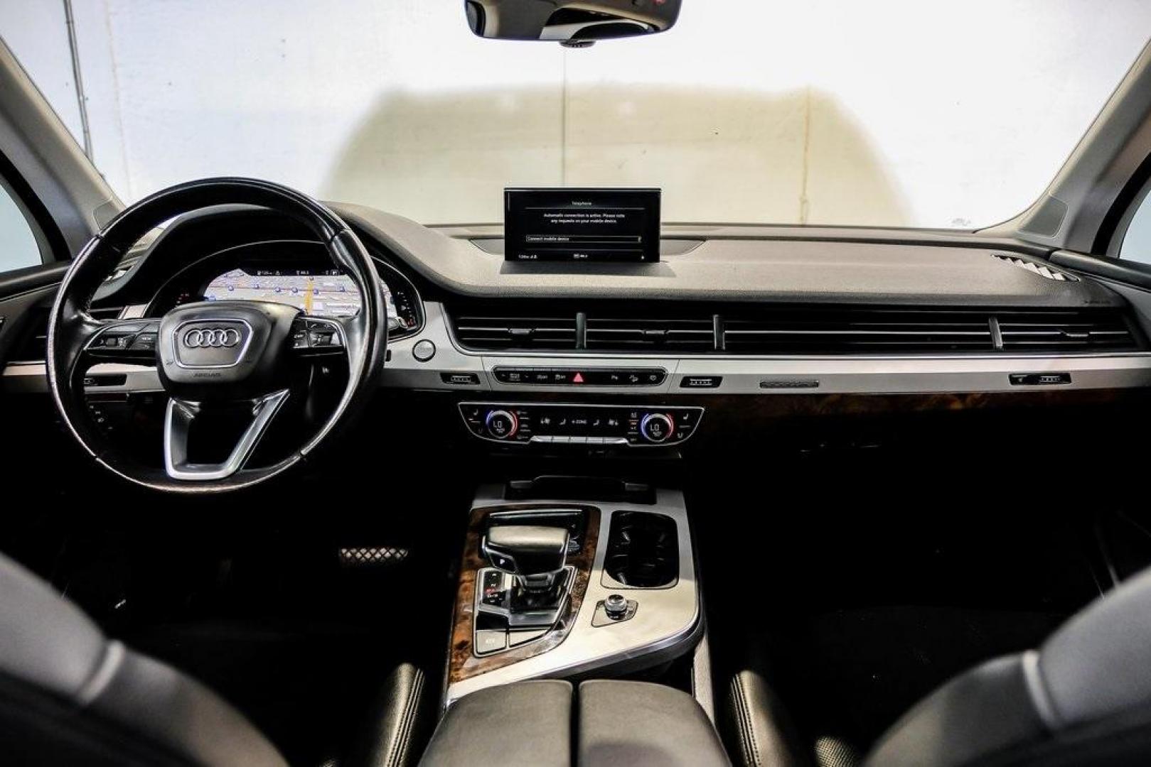 2018 Florett Silver Metallic /Black Audi Q7 2.0T Premium Plus (WA1LHAF70JD) with an 2.0L I4 TFSI DOHC engine, Automatic transmission, located at 15300 Midway Rd., Addison, TX, 75001, (972) 702-0011, 32.958321, -96.838074 - 2018 Audi Q7 3.0T Prestige Quattro<br><br>Now Available at Midway Auto Group, Addison, Texas<br><br>Luxurious, powerful, and technologically advanced the 2018 Audi Q7 Prestige Quattro represents the pinnacle of Audis three-row SUV lineup. With its supercharged V6 engine, exceptional ride quality, pr - Photo#18