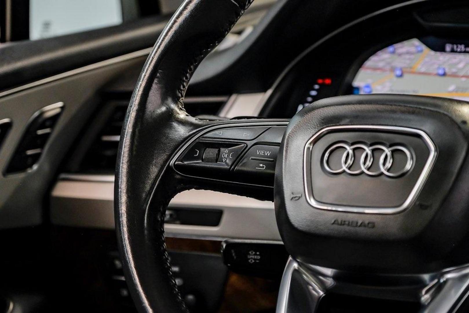 2018 Florett Silver Metallic /Black Audi Q7 2.0T Premium Plus (WA1LHAF70JD) with an 2.0L I4 TFSI DOHC engine, Automatic transmission, located at 15300 Midway Rd., Addison, TX, 75001, (972) 702-0011, 32.958321, -96.838074 - 2018 Audi Q7 3.0T Prestige Quattro<br><br>Now Available at Midway Auto Group, Addison, Texas<br><br>Luxurious, powerful, and technologically advanced the 2018 Audi Q7 Prestige Quattro represents the pinnacle of Audis three-row SUV lineup. With its supercharged V6 engine, exceptional ride quality, pr - Photo#20