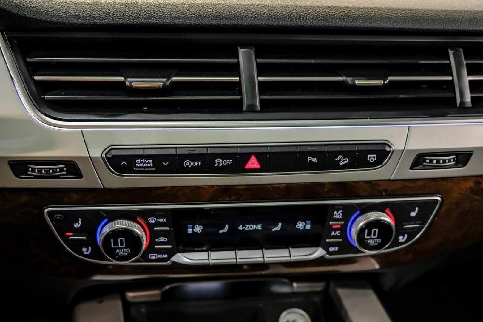 2018 Florett Silver Metallic /Black Audi Q7 2.0T Premium Plus (WA1LHAF70JD) with an 2.0L I4 TFSI DOHC engine, Automatic transmission, located at 15300 Midway Rd., Addison, TX, 75001, (972) 702-0011, 32.958321, -96.838074 - 2018 Audi Q7 3.0T Prestige Quattro<br><br>Now Available at Midway Auto Group, Addison, Texas<br><br>Luxurious, powerful, and technologically advanced the 2018 Audi Q7 Prestige Quattro represents the pinnacle of Audis three-row SUV lineup. With its supercharged V6 engine, exceptional ride quality, pr - Photo#33