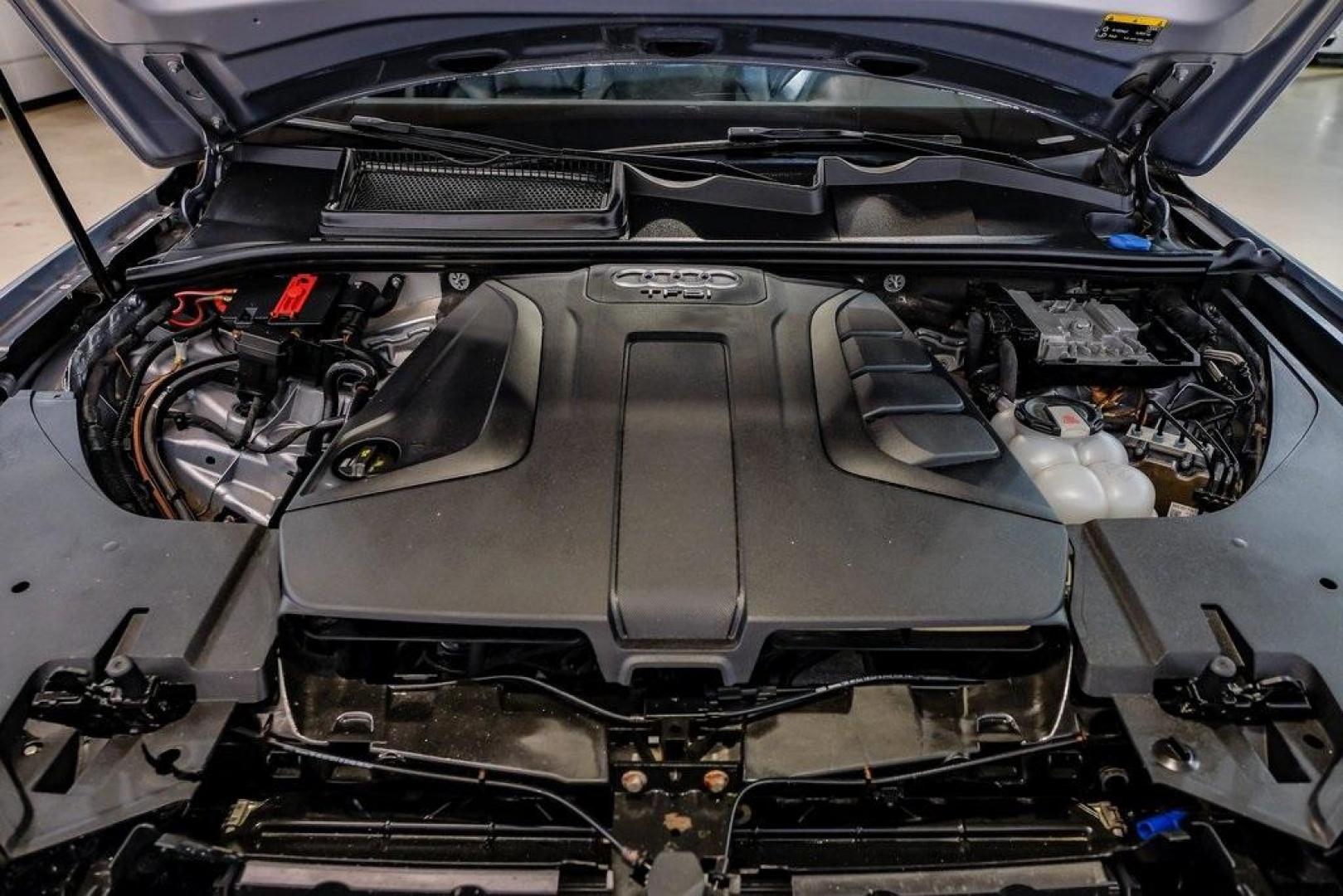 2018 Florett Silver Metallic /Black Audi Q7 2.0T Premium Plus (WA1LHAF70JD) with an 2.0L I4 TFSI DOHC engine, Automatic transmission, located at 15300 Midway Rd., Addison, TX, 75001, (972) 702-0011, 32.958321, -96.838074 - 2018 Audi Q7 3.0T Prestige Quattro<br><br>Now Available at Midway Auto Group, Addison, Texas<br><br>Luxurious, powerful, and technologically advanced the 2018 Audi Q7 Prestige Quattro represents the pinnacle of Audis three-row SUV lineup. With its supercharged V6 engine, exceptional ride quality, pr - Photo#66