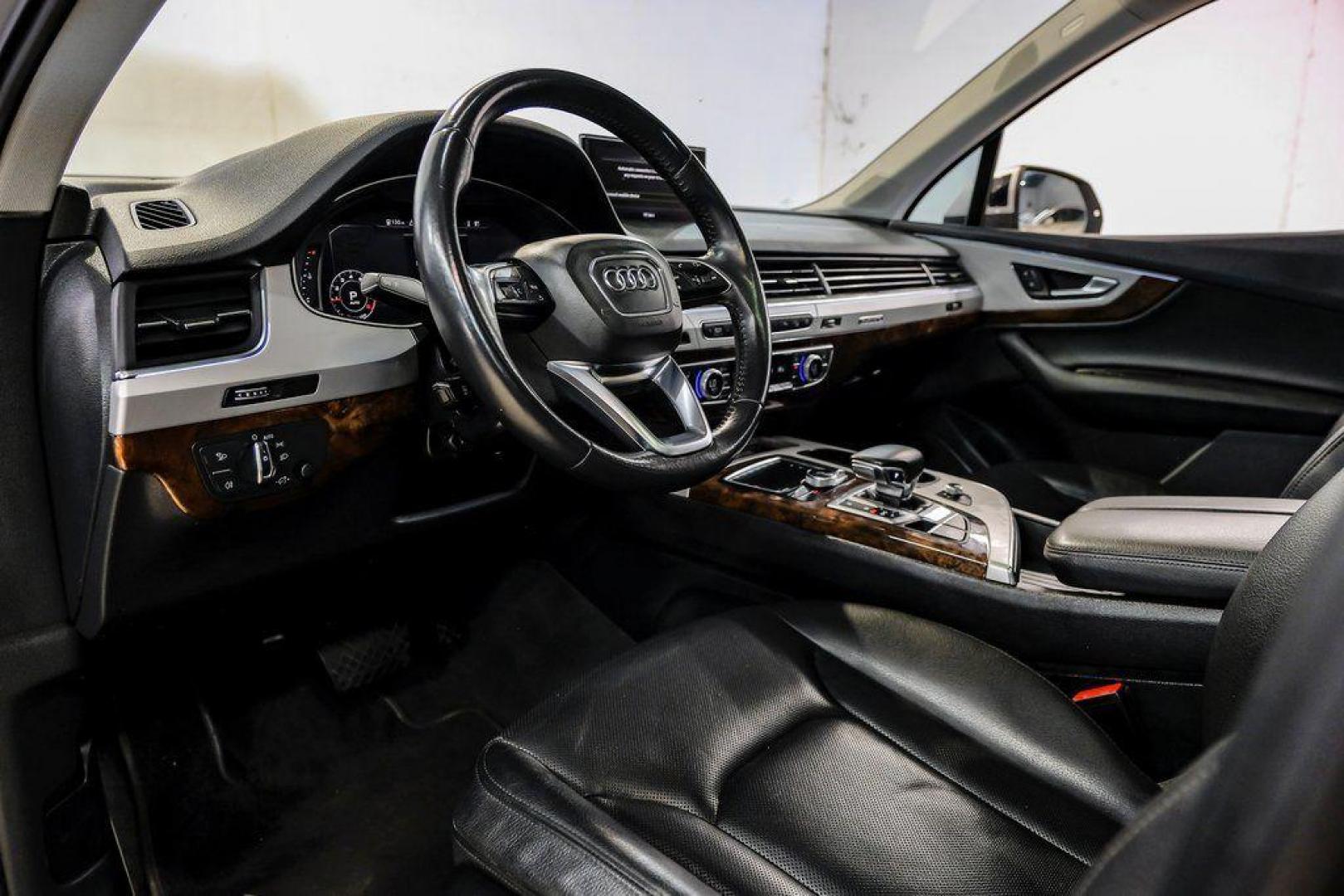 2018 Florett Silver Metallic /Black Audi Q7 2.0T Premium Plus (WA1LHAF70JD) with an 2.0L I4 TFSI DOHC engine, Automatic transmission, located at 15300 Midway Rd., Addison, TX, 75001, (972) 702-0011, 32.958321, -96.838074 - 2018 Audi Q7 3.0T Prestige Quattro<br><br>Now Available at Midway Auto Group, Addison, Texas<br><br>Luxurious, powerful, and technologically advanced the 2018 Audi Q7 Prestige Quattro represents the pinnacle of Audis three-row SUV lineup. With its supercharged V6 engine, exceptional ride quality, pr - Photo#2