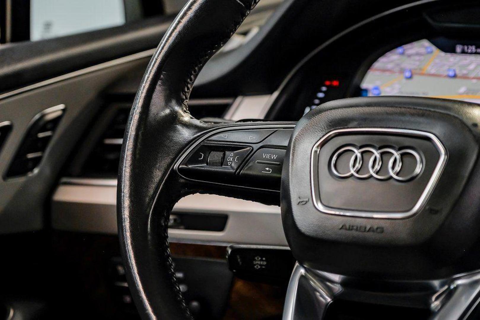 2018 Florett Silver Metallic /Black Audi Q7 2.0T Premium Plus (WA1LHAF70JD) with an 2.0L I4 TFSI DOHC engine, Automatic transmission, located at 15300 Midway Rd., Addison, TX, 75001, (972) 702-0011, 32.958321, -96.838074 - 2018 Audi Q7 3.0T Prestige Quattro<br><br>Now Available at Midway Auto Group, Addison, Texas<br><br>Luxurious, powerful, and technologically advanced the 2018 Audi Q7 Prestige Quattro represents the pinnacle of Audis three-row SUV lineup. With its supercharged V6 engine, exceptional ride quality, pr - Photo#20