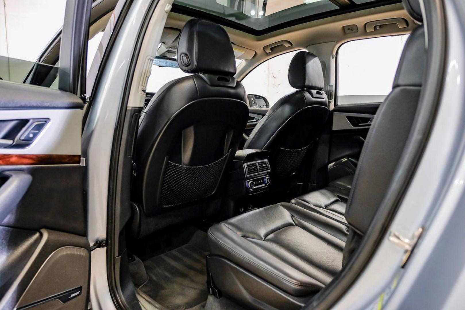 2018 Florett Silver Metallic /Black Audi Q7 2.0T Premium Plus (WA1LHAF70JD) with an 2.0L I4 TFSI DOHC engine, Automatic transmission, located at 15300 Midway Rd., Addison, TX, 75001, (972) 702-0011, 32.958321, -96.838074 - 2018 Audi Q7 3.0T Prestige Quattro<br><br>Now Available at Midway Auto Group, Addison, Texas<br><br>Luxurious, powerful, and technologically advanced the 2018 Audi Q7 Prestige Quattro represents the pinnacle of Audis three-row SUV lineup. With its supercharged V6 engine, exceptional ride quality, pr - Photo#46