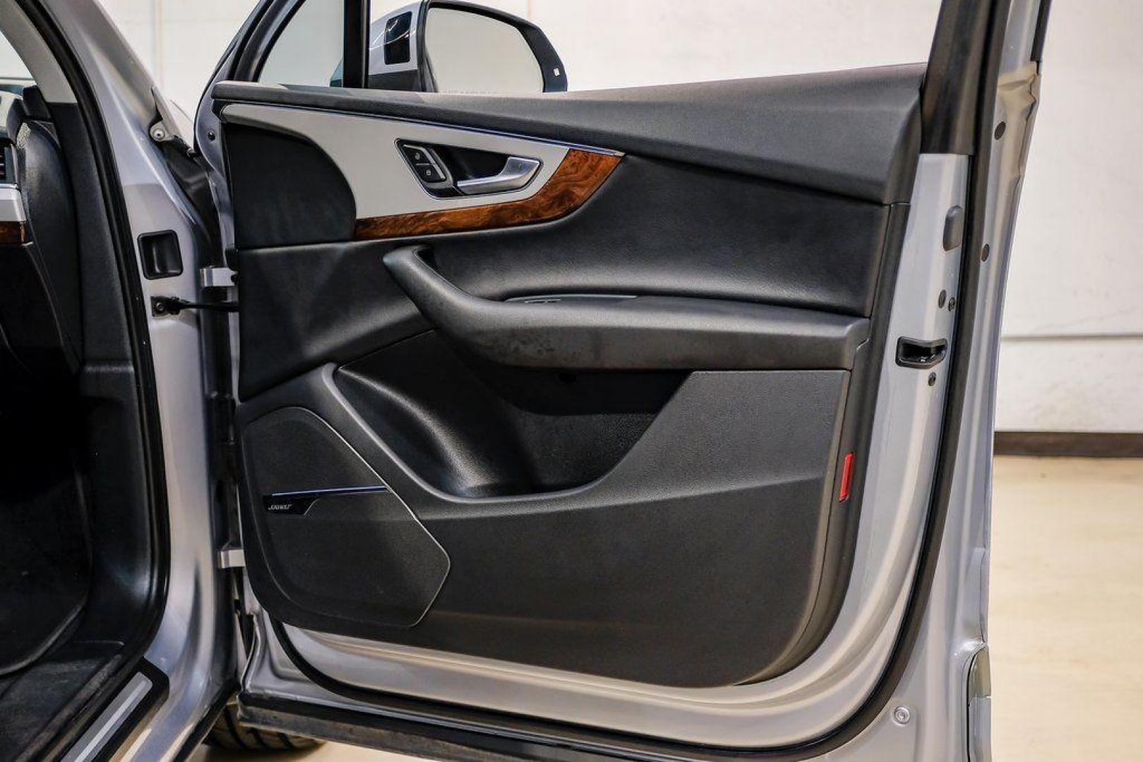 2018 Florett Silver Metallic /Black Audi Q7 2.0T Premium Plus (WA1LHAF70JD) with an 2.0L I4 TFSI DOHC engine, Automatic transmission, located at 15300 Midway Rd., Addison, TX, 75001, (972) 702-0011, 32.958321, -96.838074 - 2018 Audi Q7 3.0T Prestige Quattro<br><br>Now Available at Midway Auto Group, Addison, Texas<br><br>Luxurious, powerful, and technologically advanced the 2018 Audi Q7 Prestige Quattro represents the pinnacle of Audis three-row SUV lineup. With its supercharged V6 engine, exceptional ride quality, pr - Photo#56