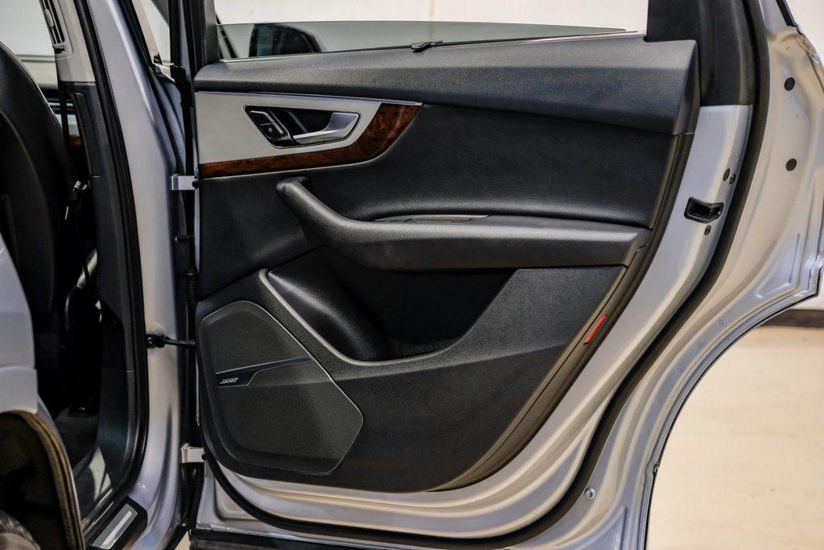 2018 Florett Silver Metallic /Black Audi Q7 2.0T Premium Plus (WA1LHAF70JD) with an 2.0L I4 TFSI DOHC engine, Automatic transmission, located at 15300 Midway Rd., Addison, TX, 75001, (972) 702-0011, 32.958321, -96.838074 - 2018 Audi Q7 3.0T Prestige Quattro<br><br>Now Available at Midway Auto Group, Addison, Texas<br><br>Luxurious, powerful, and technologically advanced the 2018 Audi Q7 Prestige Quattro represents the pinnacle of Audis three-row SUV lineup. With its supercharged V6 engine, exceptional ride quality, pr - Photo#58