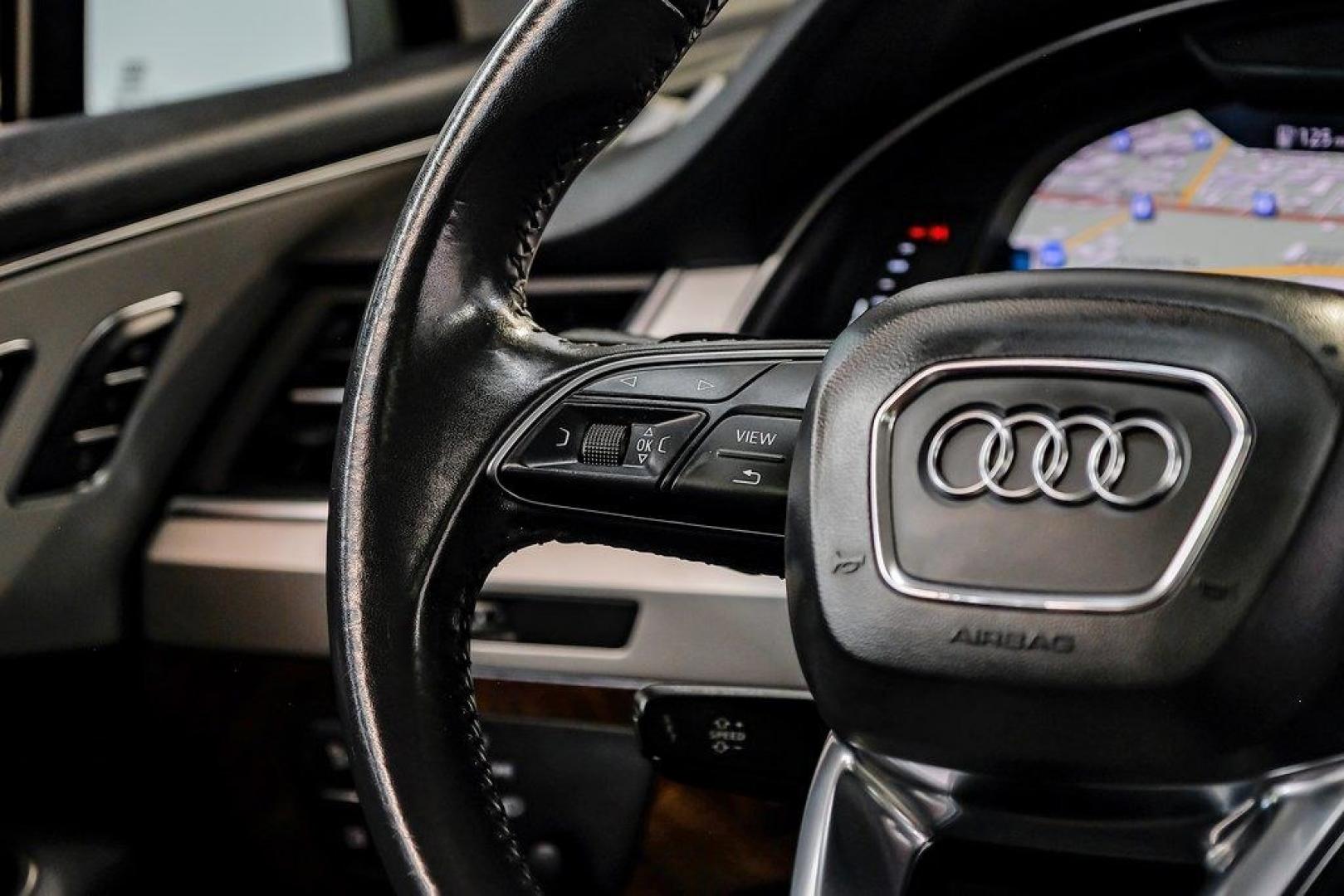 2018 Florett Silver Metallic /Black Audi Q7 2.0T Premium Plus (WA1LHAF70JD) with an 2.0L I4 TFSI DOHC engine, Automatic transmission, located at 15300 Midway Rd., Addison, TX, 75001, (972) 702-0011, 32.958321, -96.838074 - 2018 Audi Q7 3.0T Prestige Quattro<br><br>Now Available at Midway Auto Group, Addison, Texas<br><br>Luxurious, powerful, and technologically advanced the 2018 Audi Q7 Prestige Quattro represents the pinnacle of Audis three-row SUV lineup. With its supercharged V6 engine, exceptional ride quality, pr- Photo#20