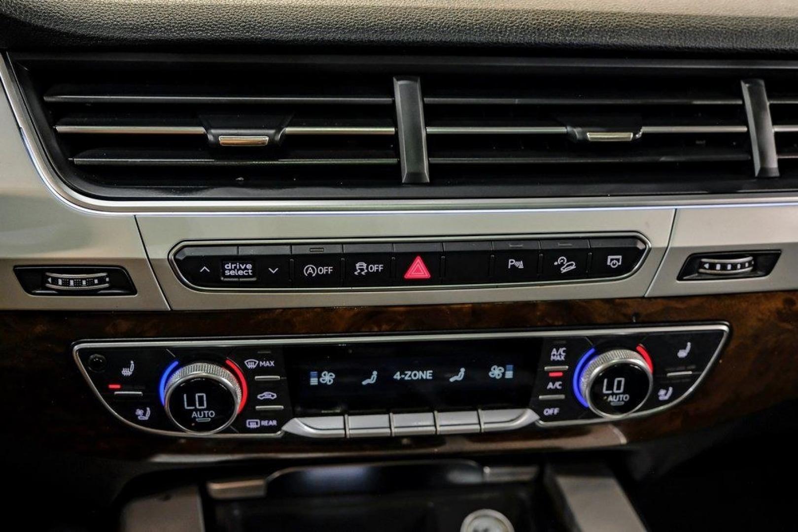 2018 Florett Silver Metallic /Black Audi Q7 2.0T Premium Plus (WA1LHAF70JD) with an 2.0L I4 TFSI DOHC engine, Automatic transmission, located at 15300 Midway Rd., Addison, TX, 75001, (972) 702-0011, 32.958321, -96.838074 - 2018 Audi Q7 3.0T Prestige Quattro<br><br>Now Available at Midway Auto Group, Addison, Texas<br><br>Luxurious, powerful, and technologically advanced the 2018 Audi Q7 Prestige Quattro represents the pinnacle of Audis three-row SUV lineup. With its supercharged V6 engine, exceptional ride quality, pr- Photo#33