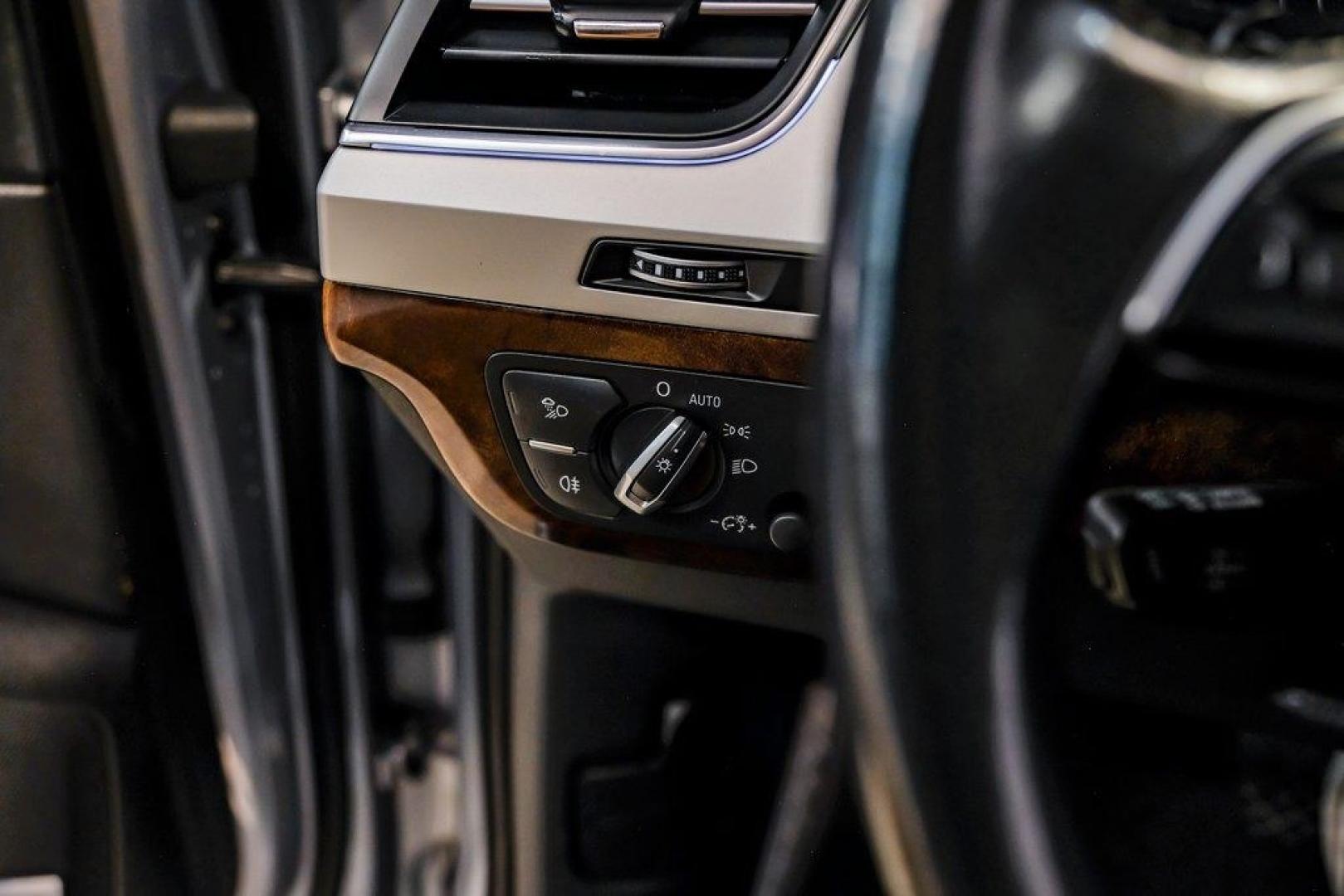 2018 Florett Silver Metallic /Black Audi Q7 2.0T Premium Plus (WA1LHAF70JD) with an 2.0L I4 TFSI DOHC engine, Automatic transmission, located at 15300 Midway Rd., Addison, TX, 75001, (972) 702-0011, 32.958321, -96.838074 - 2018 Audi Q7 3.0T Prestige Quattro<br><br>Now Available at Midway Auto Group, Addison, Texas<br><br>Luxurious, powerful, and technologically advanced the 2018 Audi Q7 Prestige Quattro represents the pinnacle of Audis three-row SUV lineup. With its supercharged V6 engine, exceptional ride quality, pr- Photo#35