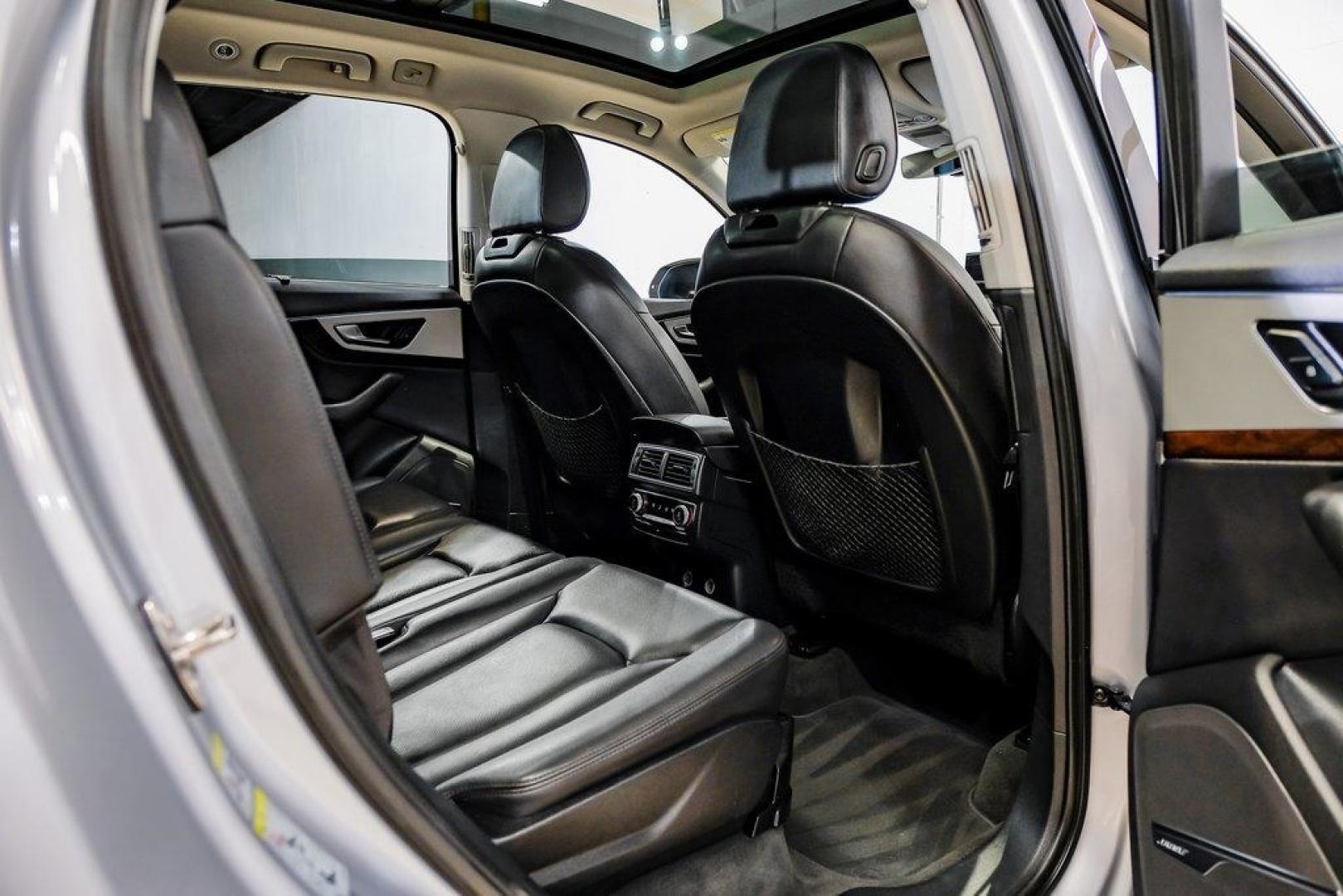 2018 Florett Silver Metallic /Black Audi Q7 2.0T Premium Plus (WA1LHAF70JD) with an 2.0L I4 TFSI DOHC engine, Automatic transmission, located at 15300 Midway Rd., Addison, TX, 75001, (972) 702-0011, 32.958321, -96.838074 - 2018 Audi Q7 3.0T Prestige Quattro<br><br>Now Available at Midway Auto Group, Addison, Texas<br><br>Luxurious, powerful, and technologically advanced the 2018 Audi Q7 Prestige Quattro represents the pinnacle of Audis three-row SUV lineup. With its supercharged V6 engine, exceptional ride quality, pr- Photo#44