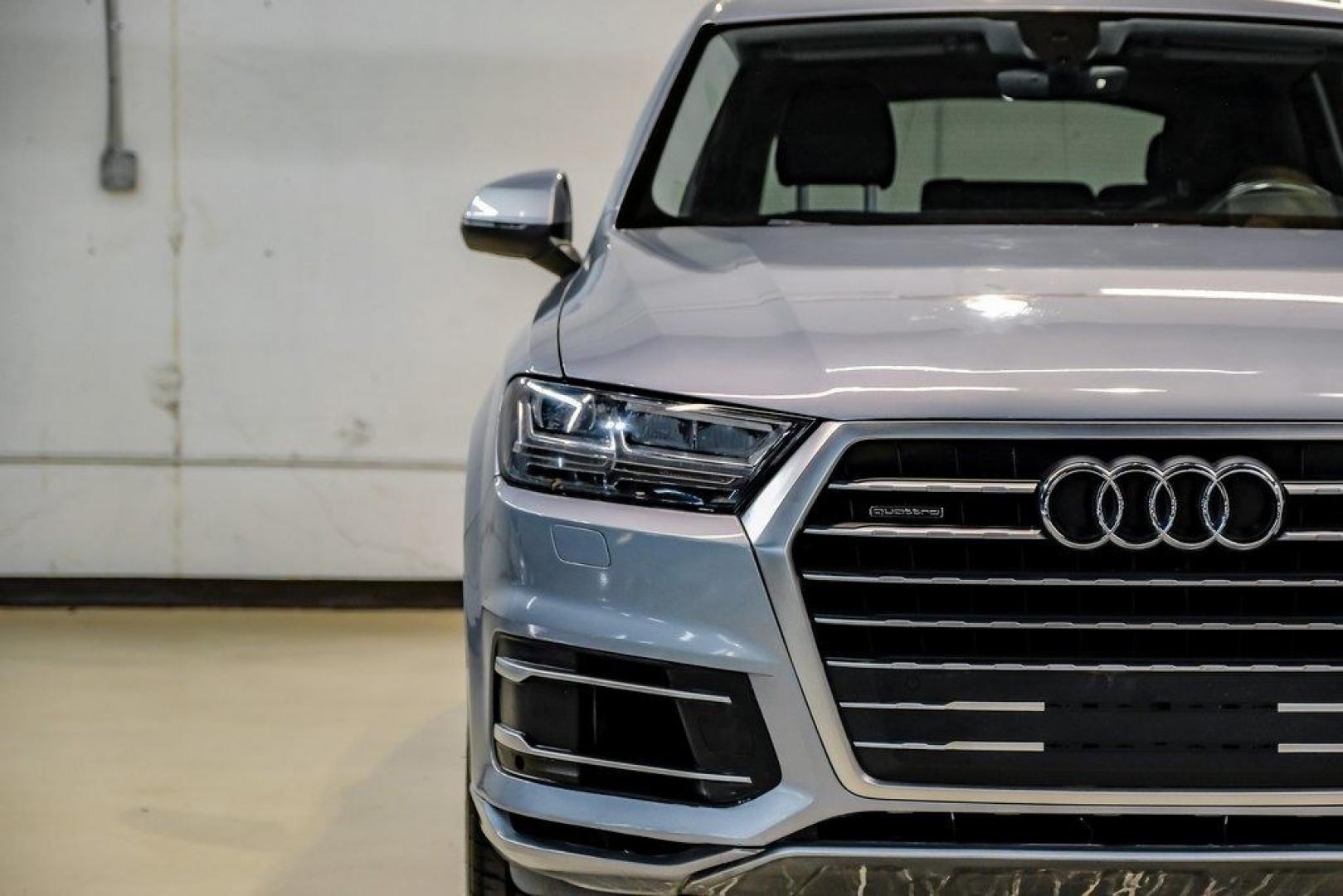 2018 Florett Silver Metallic /Black Audi Q7 2.0T Premium Plus (WA1LHAF70JD) with an 2.0L I4 TFSI DOHC engine, Automatic transmission, located at 15300 Midway Rd., Addison, TX, 75001, (972) 702-0011, 32.958321, -96.838074 - 2018 Audi Q7 3.0T Prestige Quattro<br><br>Now Available at Midway Auto Group, Addison, Texas<br><br>Luxurious, powerful, and technologically advanced the 2018 Audi Q7 Prestige Quattro represents the pinnacle of Audis three-row SUV lineup. With its supercharged V6 engine, exceptional ride quality, pr- Photo#59