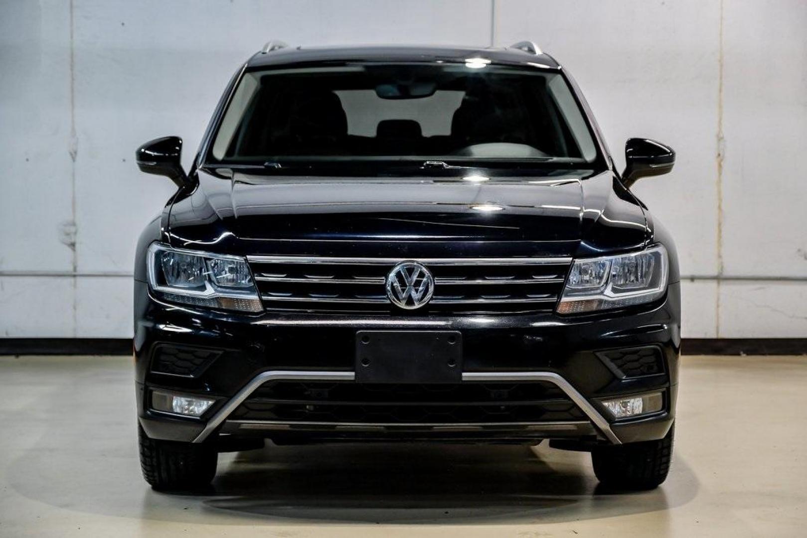 2019 Deep Black /Golden Oak and Black Volkswagen Tiguan 2.0T SEL (3VV3B7AX4KM) with an 2.0L TSI DOHC engine, Automatic transmission, located at 15300 Midway Rd., Addison, TX, 75001, (972) 702-0011, 32.958321, -96.838074 - Photo#7