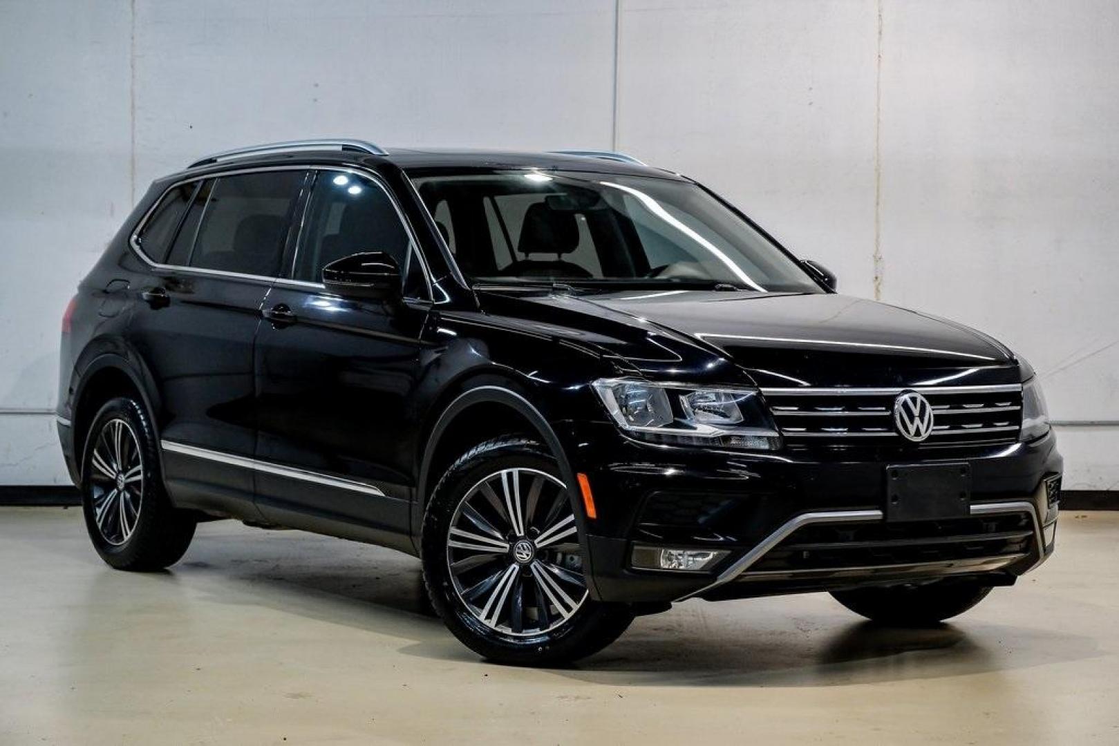 2019 Deep Black /Golden Oak and Black Volkswagen Tiguan 2.0T SEL (3VV3B7AX4KM) with an 2.0L TSI DOHC engine, Automatic transmission, located at 15300 Midway Rd., Addison, TX, 75001, (972) 702-0011, 32.958321, -96.838074 - Photo#8