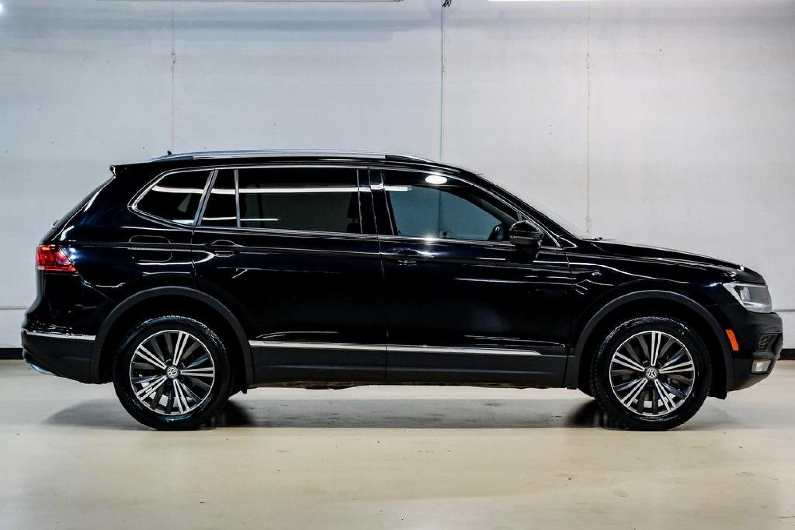 2019 Deep Black /Golden Oak and Black Volkswagen Tiguan 2.0T SEL (3VV3B7AX4KM) with an 2.0L TSI DOHC engine, Automatic transmission, located at 15300 Midway Rd., Addison, TX, 75001, (972) 702-0011, 32.958321, -96.838074 - Photo#9