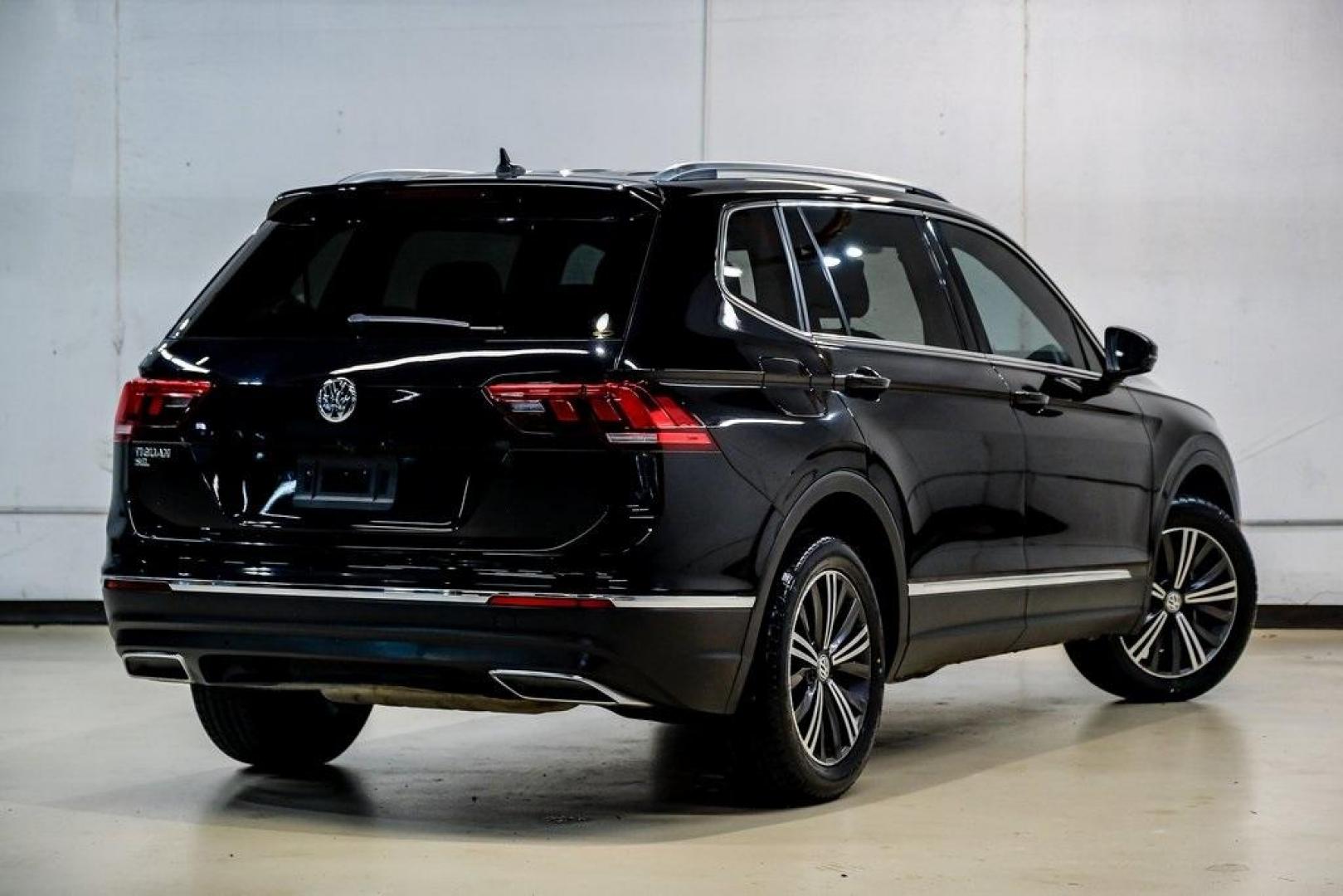 2019 Deep Black /Golden Oak and Black Volkswagen Tiguan 2.0T SEL (3VV3B7AX4KM) with an 2.0L TSI DOHC engine, Automatic transmission, located at 15300 Midway Rd., Addison, TX, 75001, (972) 702-0011, 32.958321, -96.838074 - Photo#10