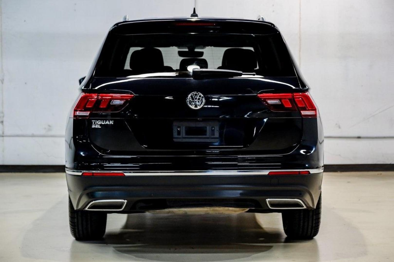 2019 Deep Black /Golden Oak and Black Volkswagen Tiguan 2.0T SEL (3VV3B7AX4KM) with an 2.0L TSI DOHC engine, Automatic transmission, located at 15300 Midway Rd., Addison, TX, 75001, (972) 702-0011, 32.958321, -96.838074 - Photo#13