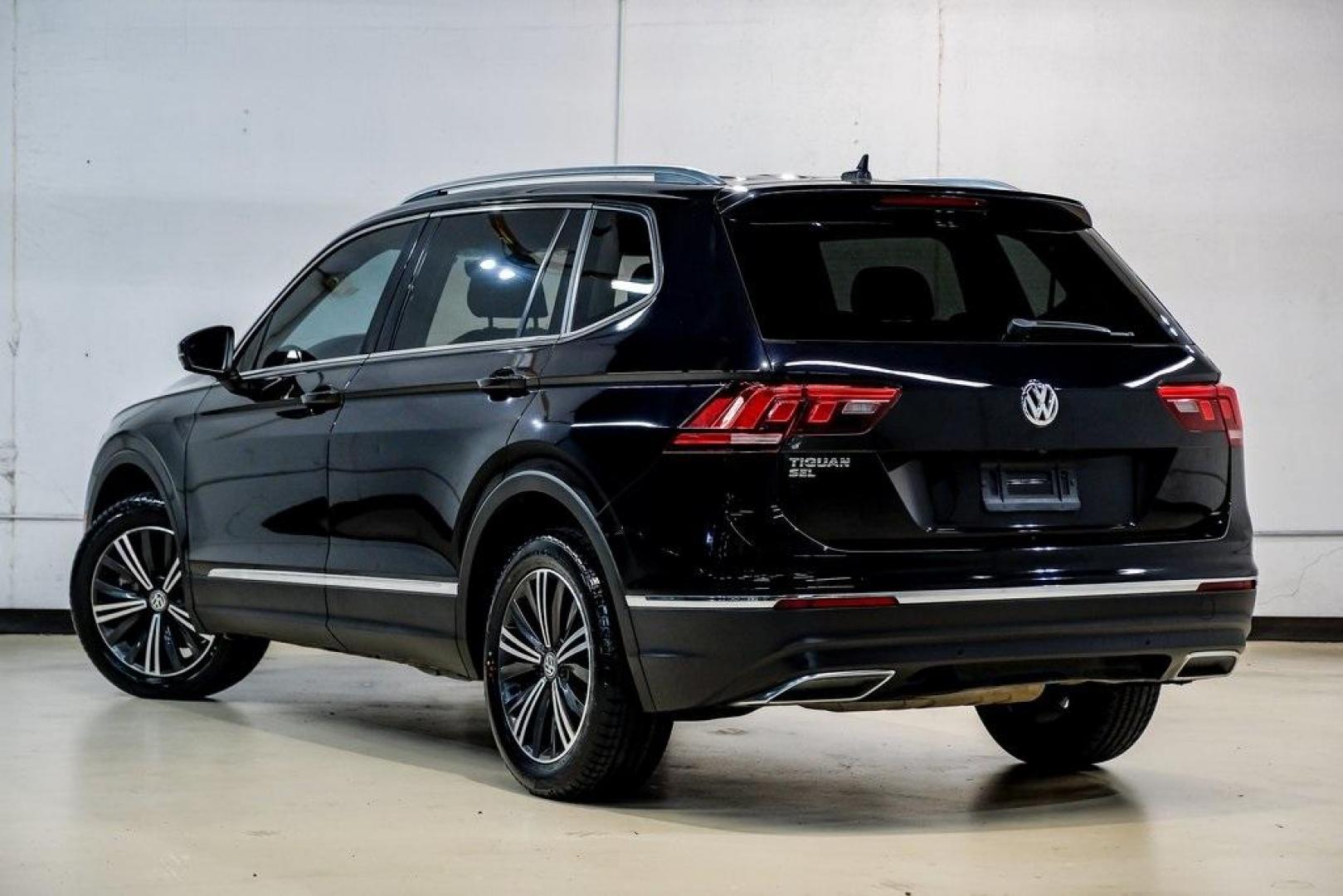 2019 Deep Black /Golden Oak and Black Volkswagen Tiguan 2.0T SEL (3VV3B7AX4KM) with an 2.0L TSI DOHC engine, Automatic transmission, located at 15300 Midway Rd., Addison, TX, 75001, (972) 702-0011, 32.958321, -96.838074 - Photo#14