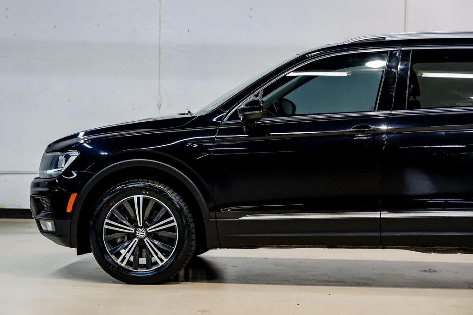 2019 Deep Black /Golden Oak and Black Volkswagen Tiguan 2.0T SEL (3VV3B7AX4KM) with an 2.0L TSI DOHC engine, Automatic transmission, located at 15300 Midway Rd., Addison, TX, 75001, (972) 702-0011, 32.958321, -96.838074 - Photo#16
