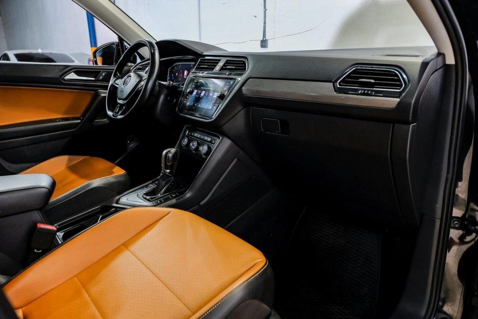 2019 Deep Black /Golden Oak and Black Volkswagen Tiguan 2.0T SEL (3VV3B7AX4KM) with an 2.0L TSI DOHC engine, Automatic transmission, located at 15300 Midway Rd., Addison, TX, 75001, (972) 702-0011, 32.958321, -96.838074 - Photo#18