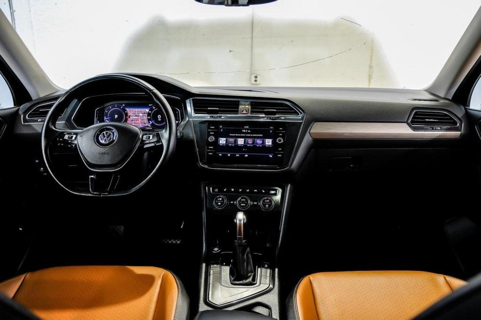 2019 Deep Black /Golden Oak and Black Volkswagen Tiguan 2.0T SEL (3VV3B7AX4KM) with an 2.0L TSI DOHC engine, Automatic transmission, located at 15300 Midway Rd., Addison, TX, 75001, (972) 702-0011, 32.958321, -96.838074 - Photo#20