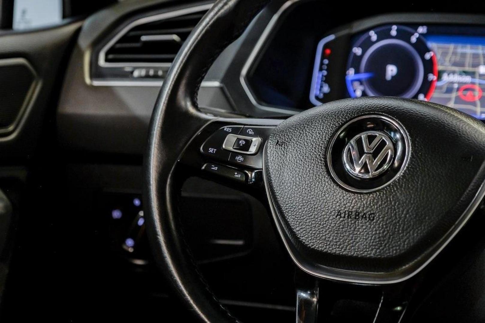 2019 Deep Black /Golden Oak and Black Volkswagen Tiguan 2.0T SEL (3VV3B7AX4KM) with an 2.0L TSI DOHC engine, Automatic transmission, located at 15300 Midway Rd., Addison, TX, 75001, (972) 702-0011, 32.958321, -96.838074 - Photo#22