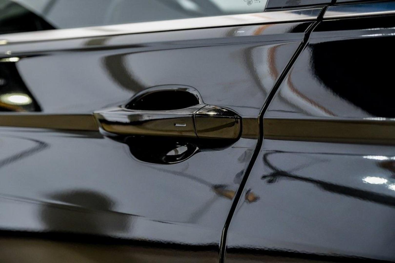 2019 Deep Black /Golden Oak and Black Volkswagen Tiguan 2.0T SEL (3VV3B7AX4KM) with an 2.0L TSI DOHC engine, Automatic transmission, located at 15300 Midway Rd., Addison, TX, 75001, (972) 702-0011, 32.958321, -96.838074 - Photo#46