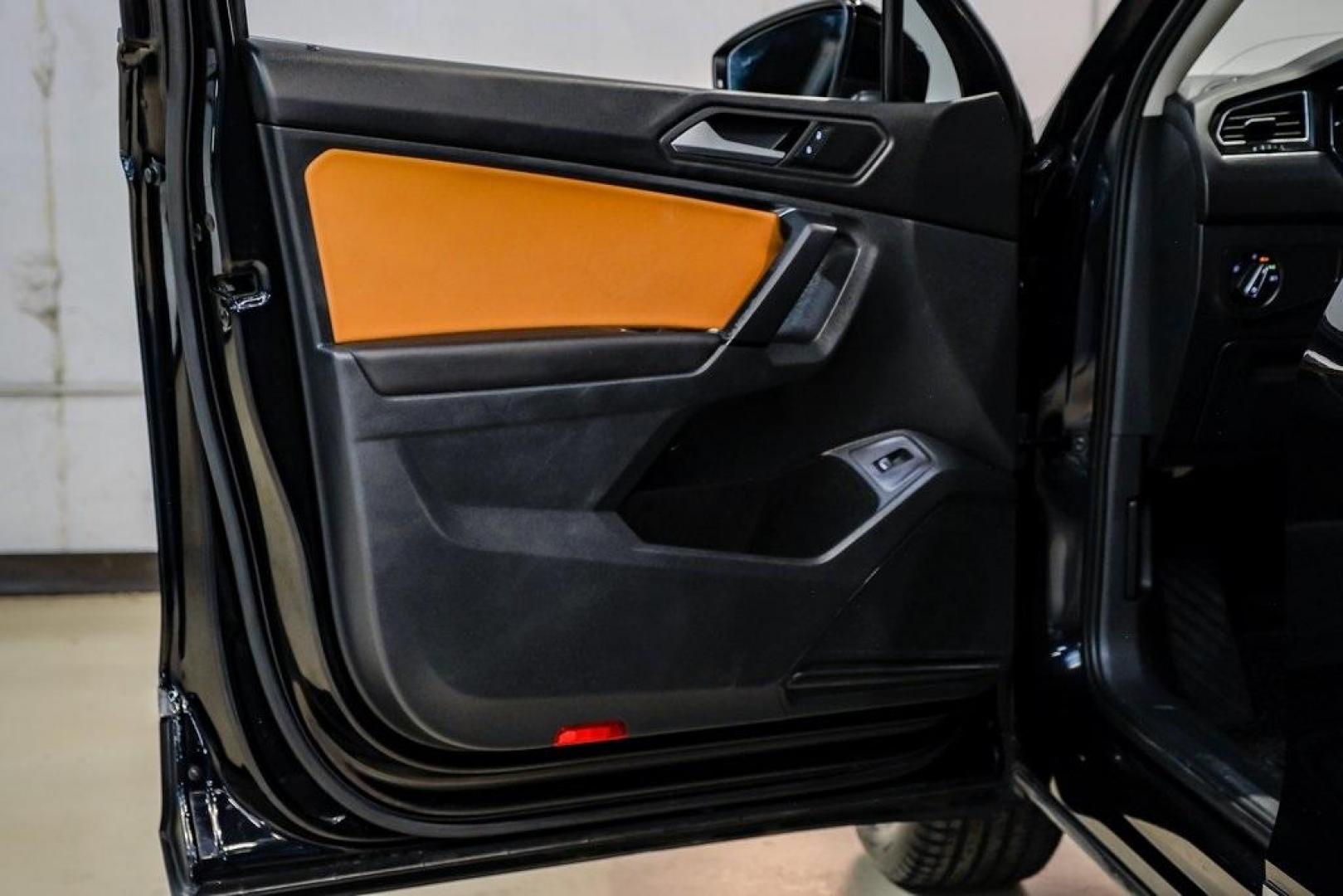 2019 Deep Black /Golden Oak and Black Volkswagen Tiguan 2.0T SEL (3VV3B7AX4KM) with an 2.0L TSI DOHC engine, Automatic transmission, located at 15300 Midway Rd., Addison, TX, 75001, (972) 702-0011, 32.958321, -96.838074 - Photo#48