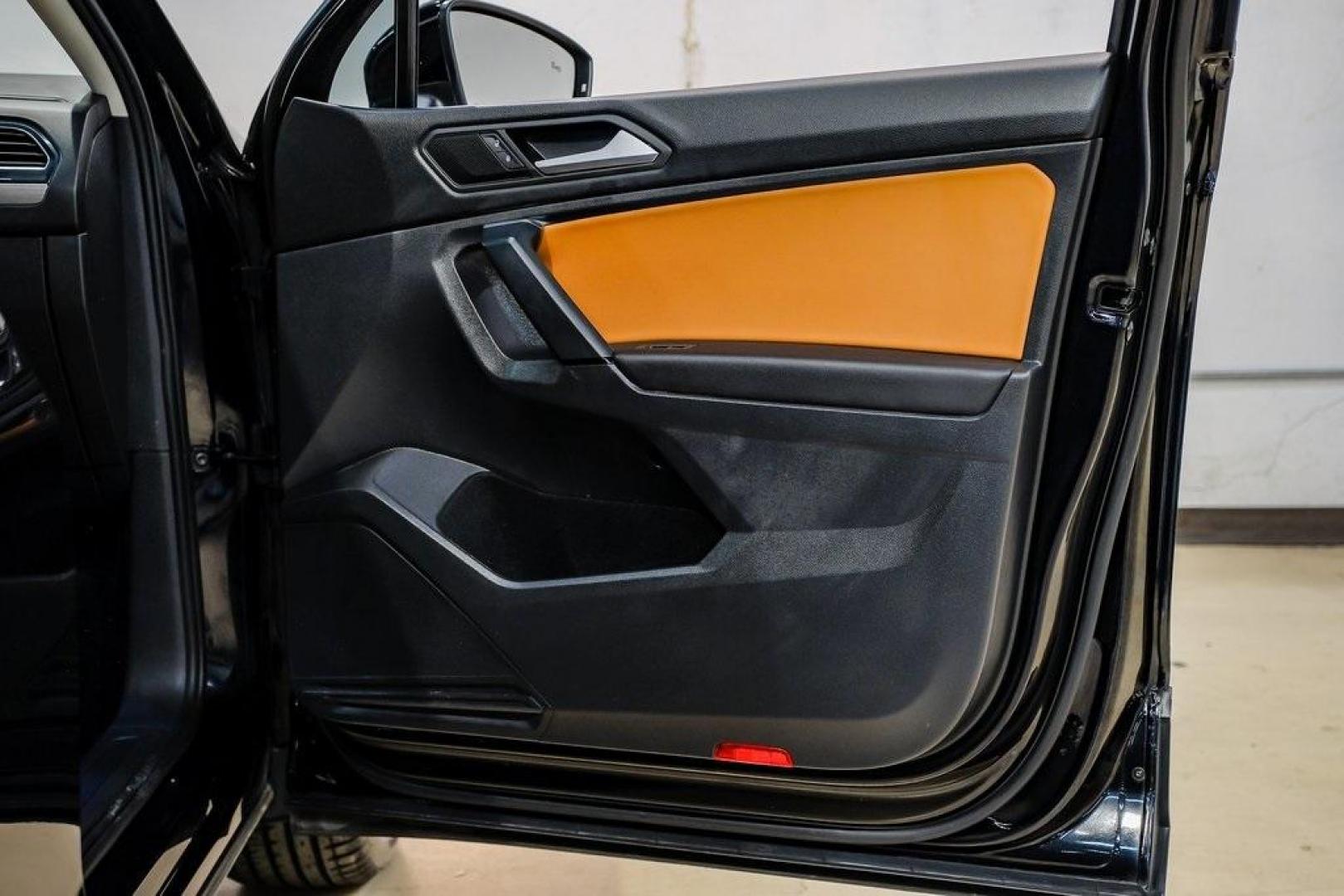 2019 Deep Black /Golden Oak and Black Volkswagen Tiguan 2.0T SEL (3VV3B7AX4KM) with an 2.0L TSI DOHC engine, Automatic transmission, located at 15300 Midway Rd., Addison, TX, 75001, (972) 702-0011, 32.958321, -96.838074 - Photo#51