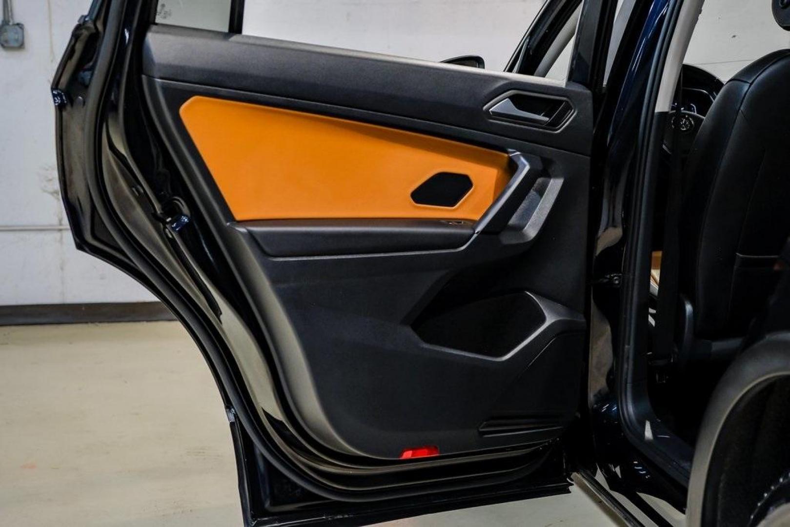 2019 Deep Black /Golden Oak and Black Volkswagen Tiguan 2.0T SEL (3VV3B7AX4KM) with an 2.0L TSI DOHC engine, Automatic transmission, located at 15300 Midway Rd., Addison, TX, 75001, (972) 702-0011, 32.958321, -96.838074 - Photo#52