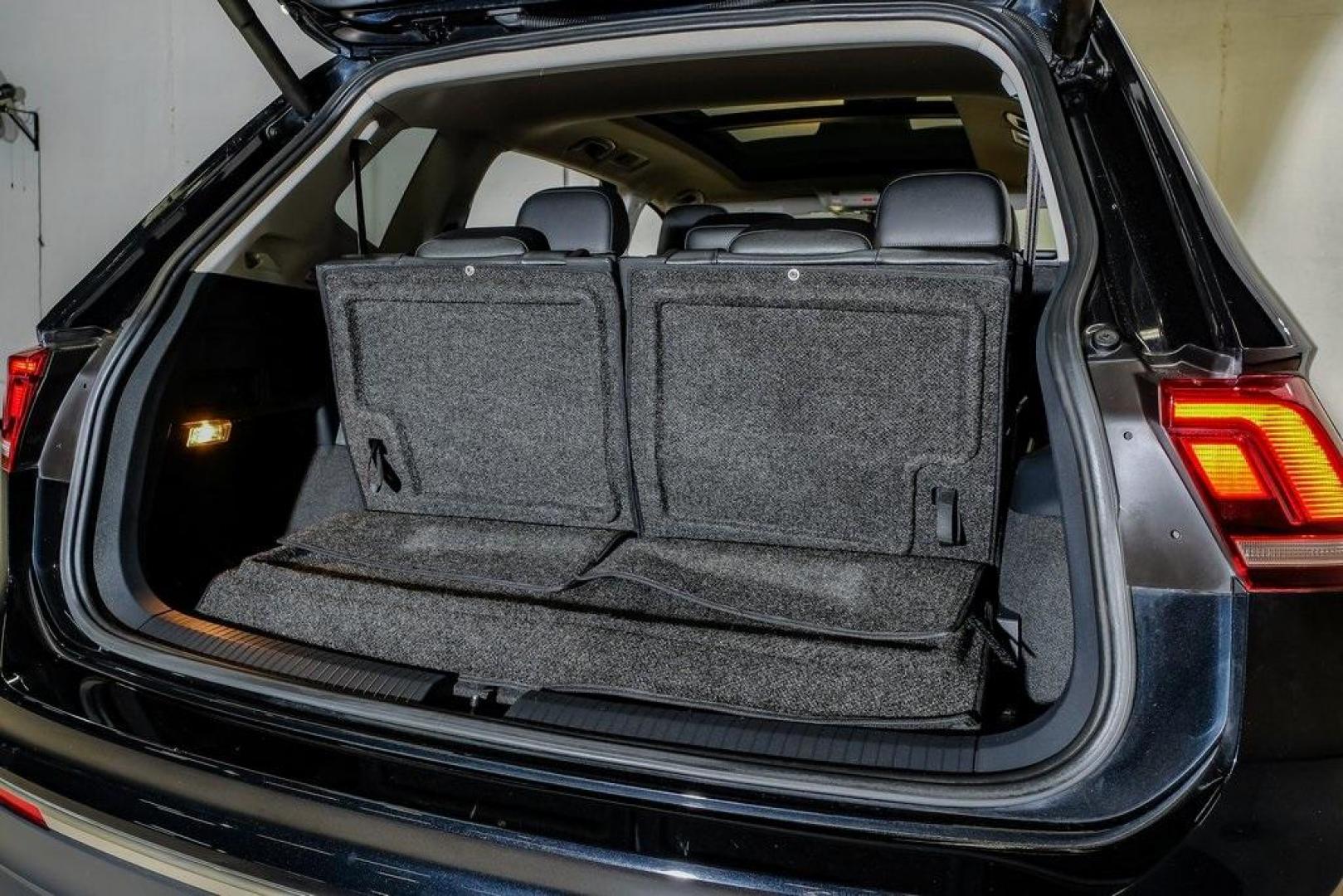 2019 Deep Black /Golden Oak and Black Volkswagen Tiguan 2.0T SEL (3VV3B7AX4KM) with an 2.0L TSI DOHC engine, Automatic transmission, located at 15300 Midway Rd., Addison, TX, 75001, (972) 702-0011, 32.958321, -96.838074 - Photo#59