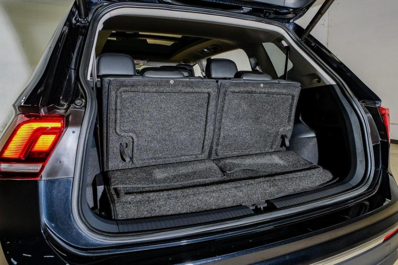 2019 Deep Black /Golden Oak and Black Volkswagen Tiguan 2.0T SEL (3VV3B7AX4KM) with an 2.0L TSI DOHC engine, Automatic transmission, located at 15300 Midway Rd., Addison, TX, 75001, (972) 702-0011, 32.958321, -96.838074 - Photo#60